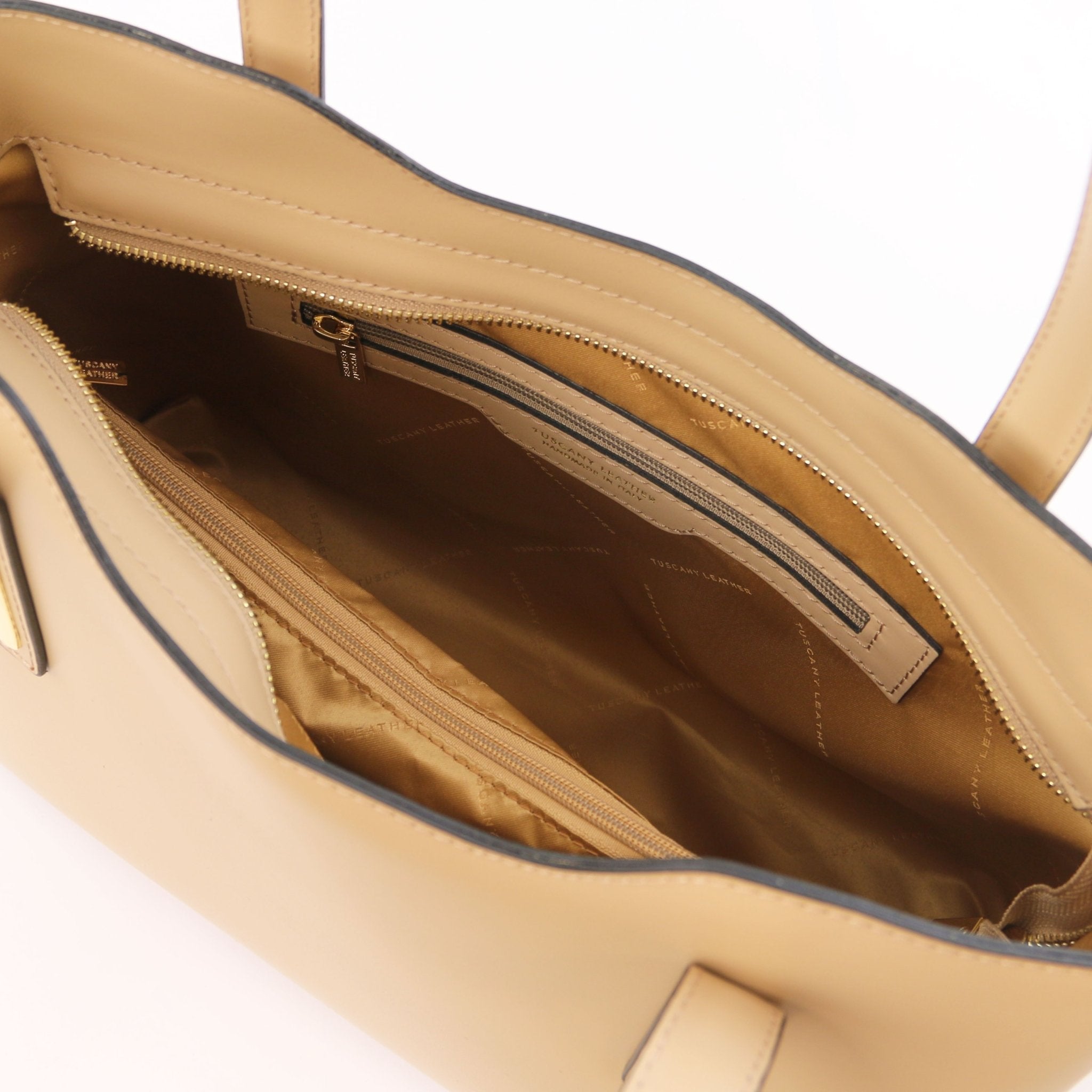 Olimpia Italian Leather Tote Bag in Champagne on white background, interior view showing side zip pocket - L'Atelier Global