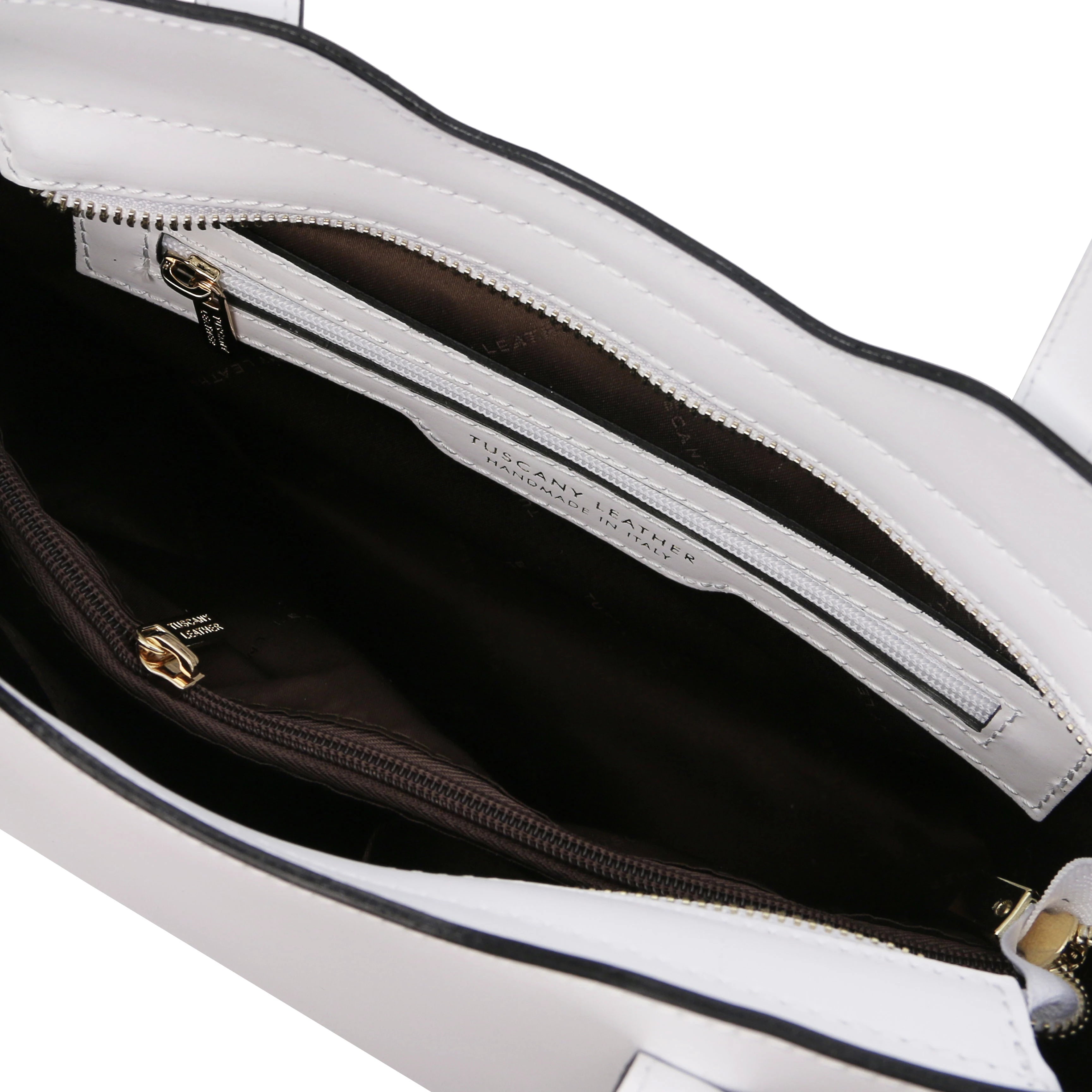 Interior Zip Pocket View Olimpia Leather Tote in White Small Size showing dark brown lining
