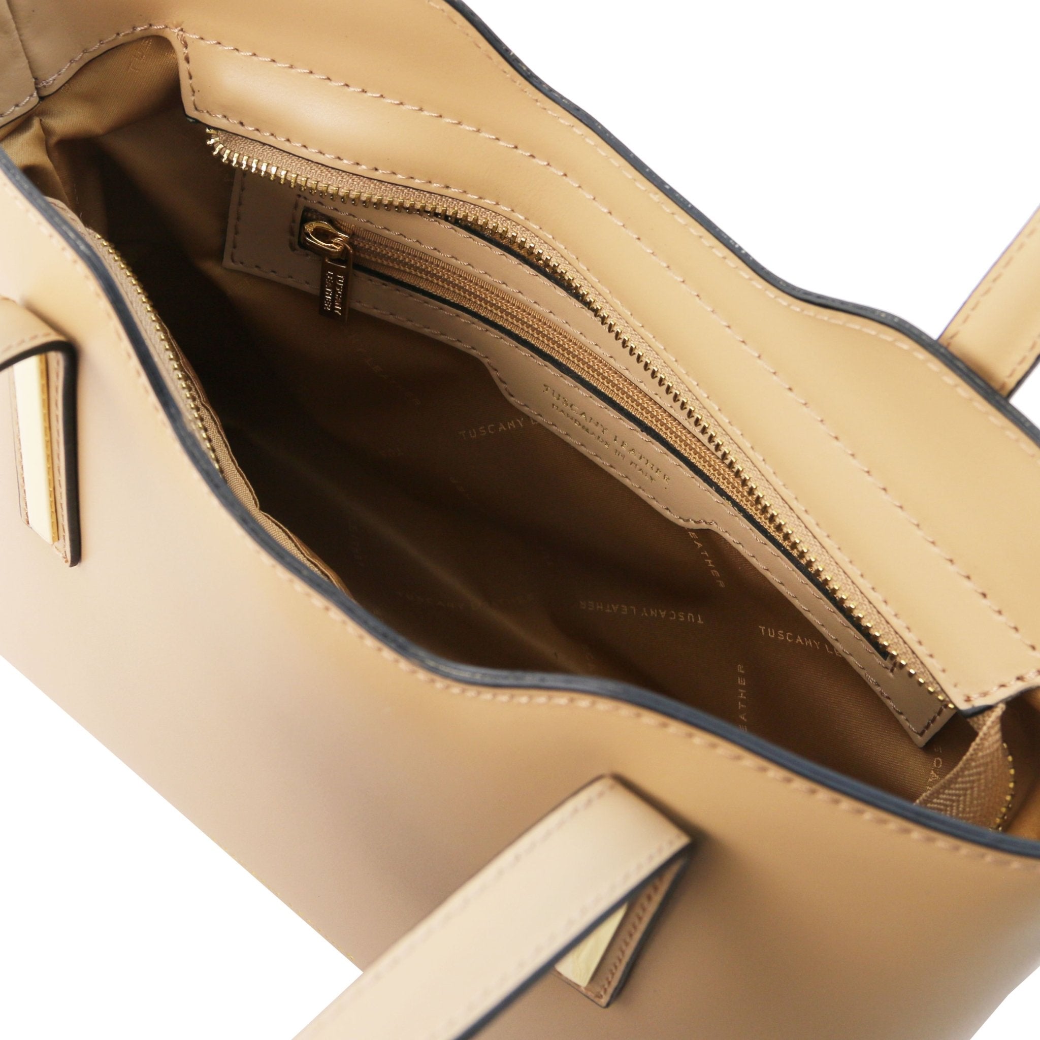 Interior Zip Pocket View Olimpia Leather Tote in Champagne Small Size showing matching lining