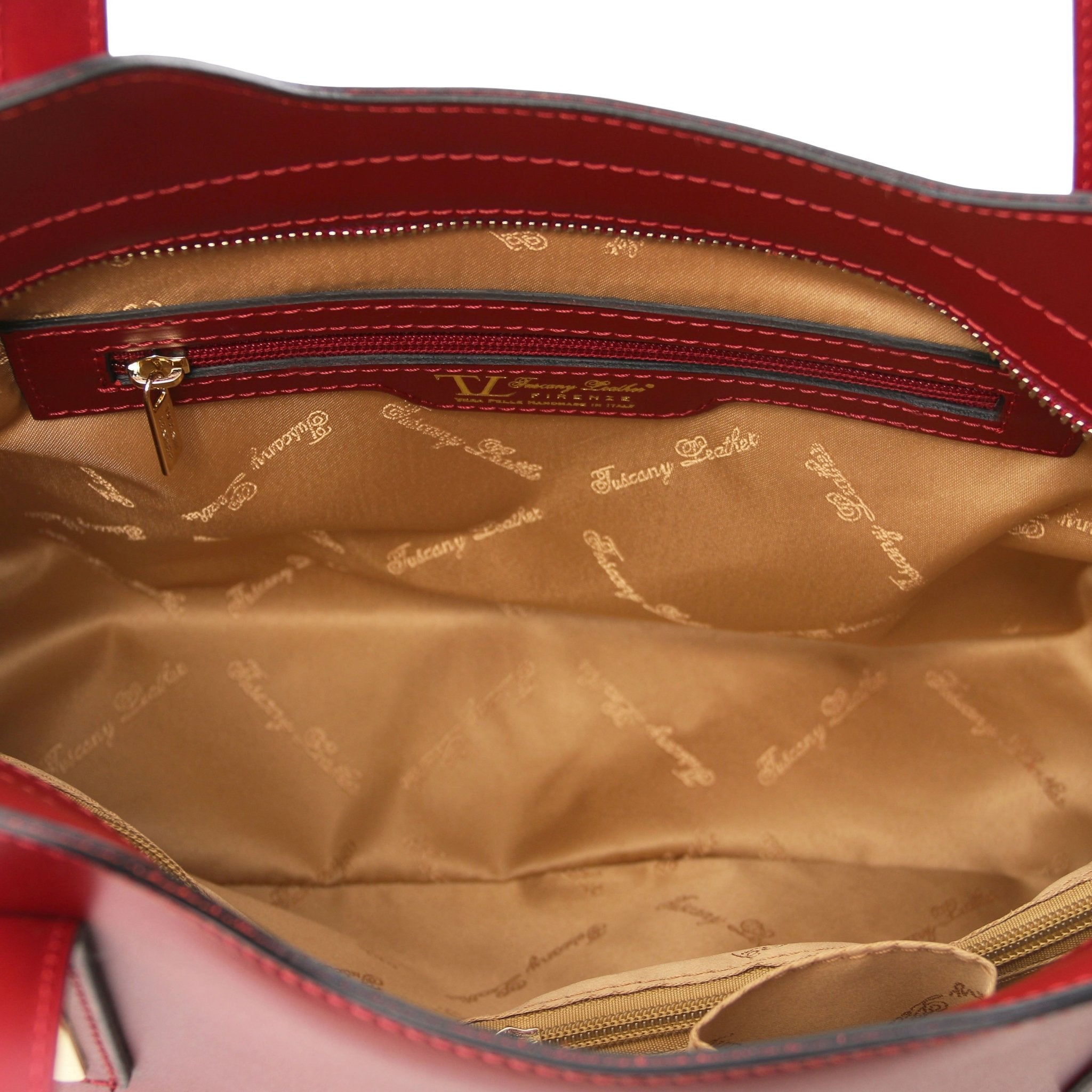 Interior Zip Pocket View Olimpia Leather Tote in Red Small Size showing beige lining