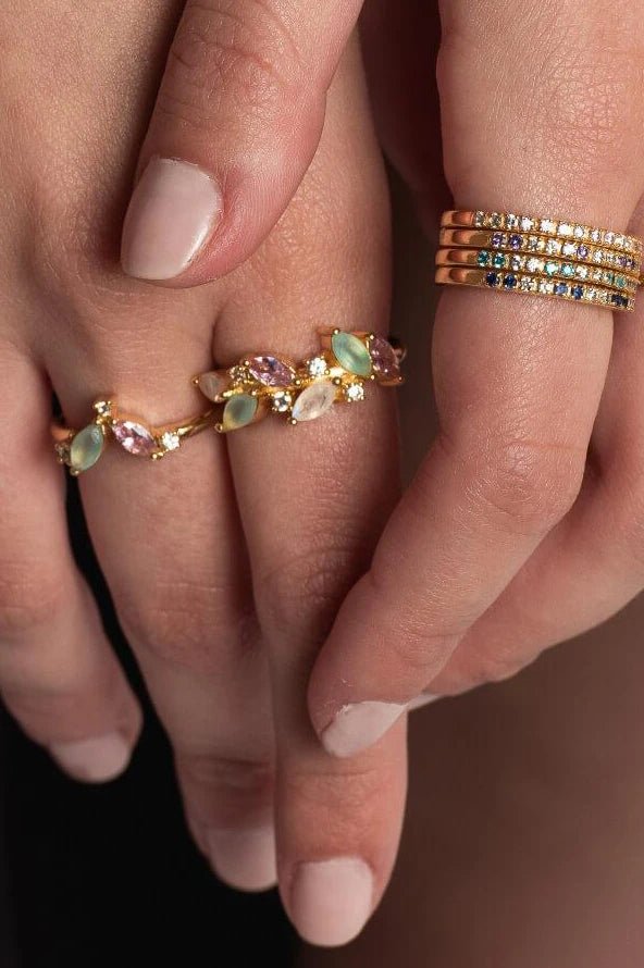 Close up view of the Padma Lotus Flower Adjustable Ring on a model's fingers - L'Atelier Global