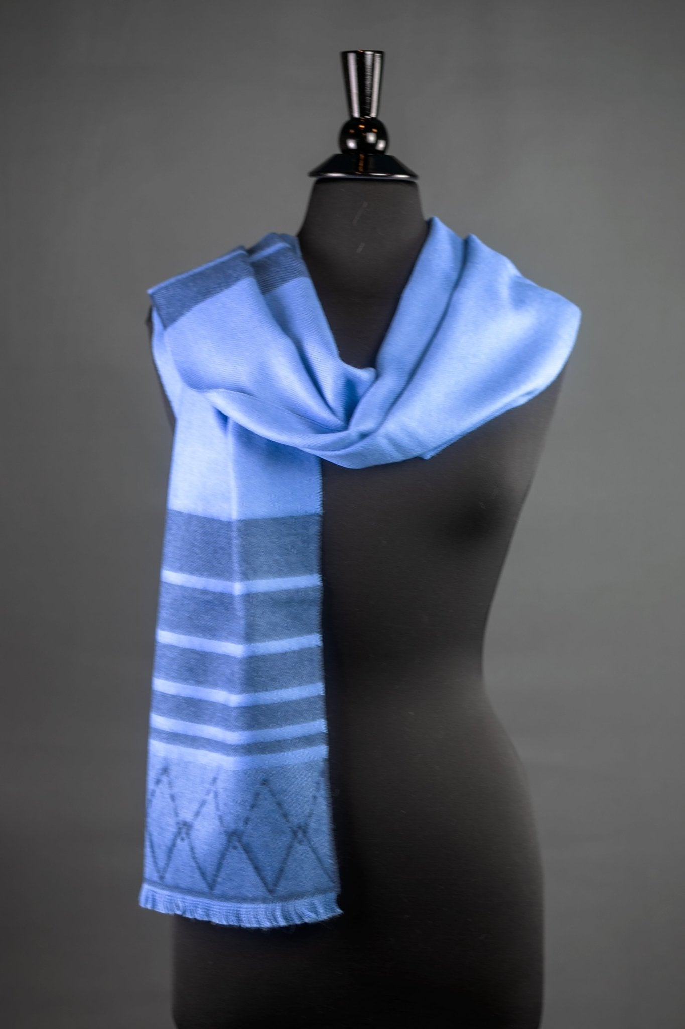 Qenko Peruvian Baby Alpaca Scarf in vibrant blue on a black bust form, gray background- L'Atelier Global