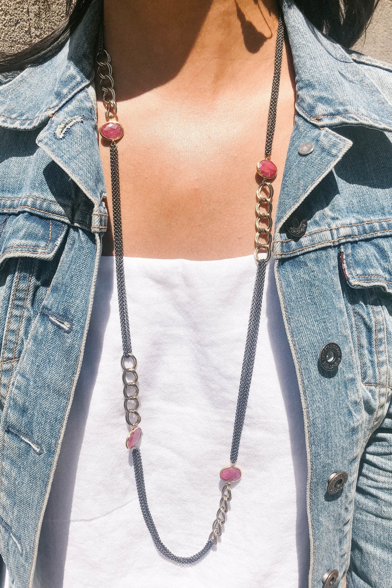 Ruby Mixed Metal Antique Long Necklace full length on female model wearing a denim jacket