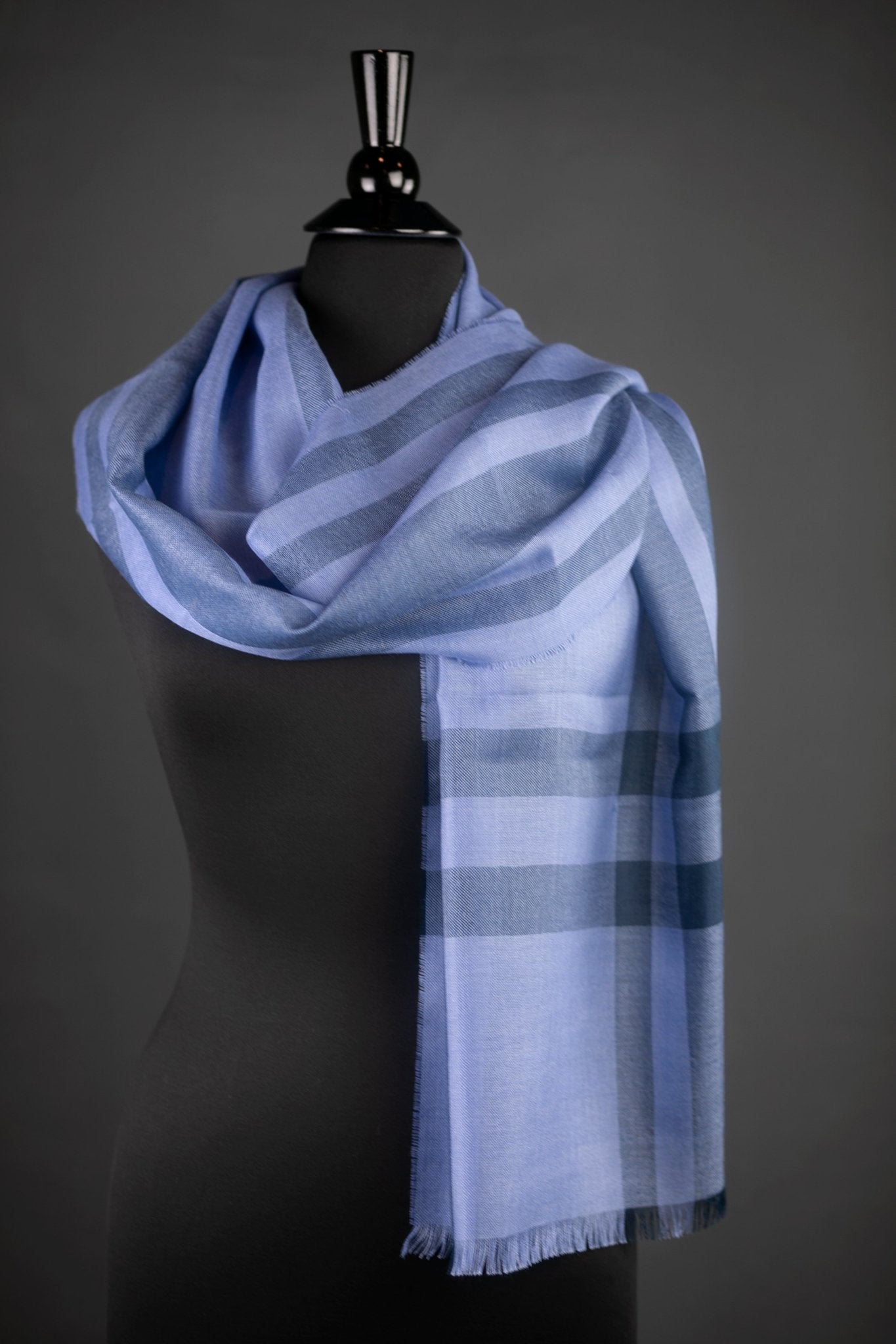 Sachacha Peruvian Baby Alpaca and Silk Stole in blue on a black bust form with a daky gray background