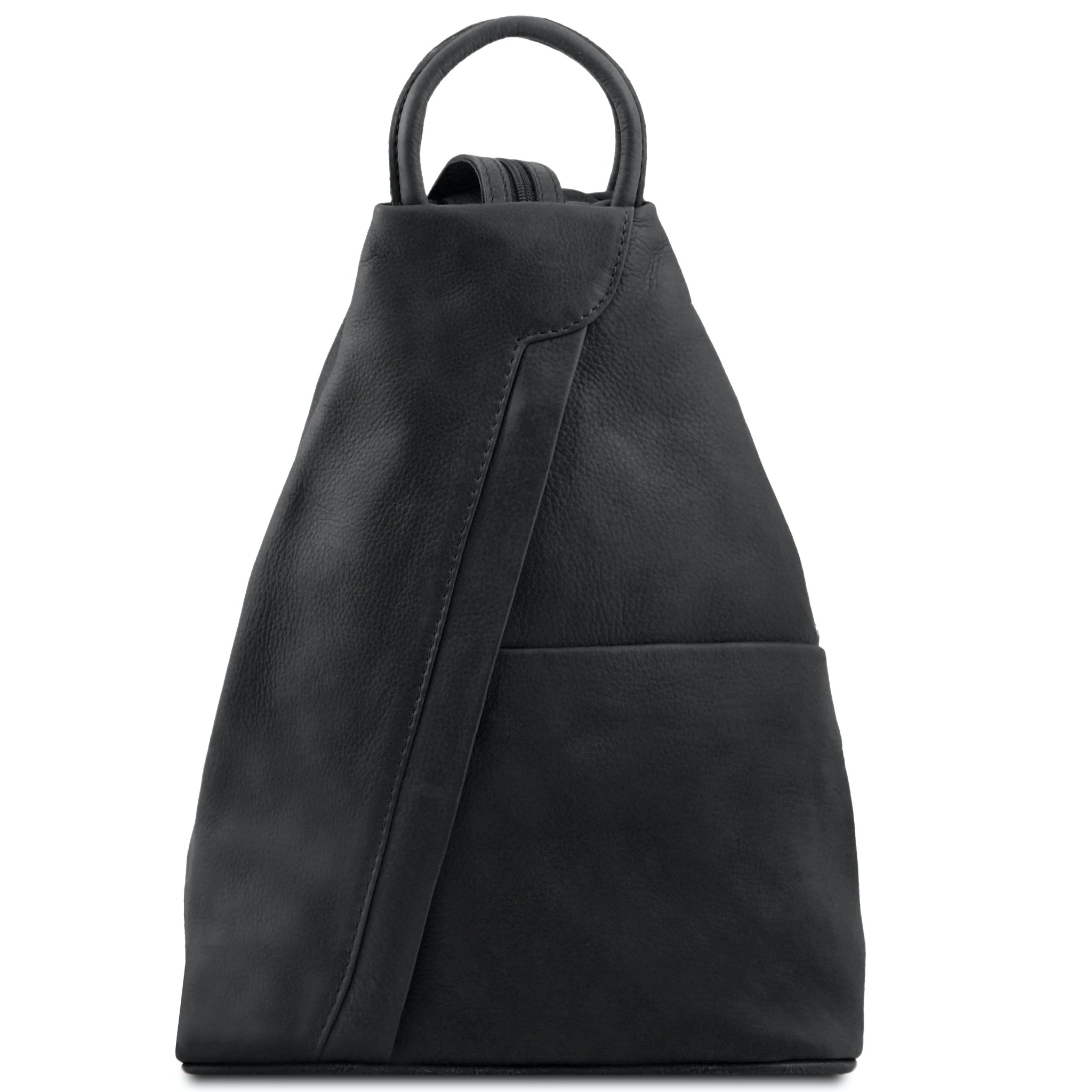 Shanghai Full Grain Leather Backpack in black front view showing front angled zip and open pocket