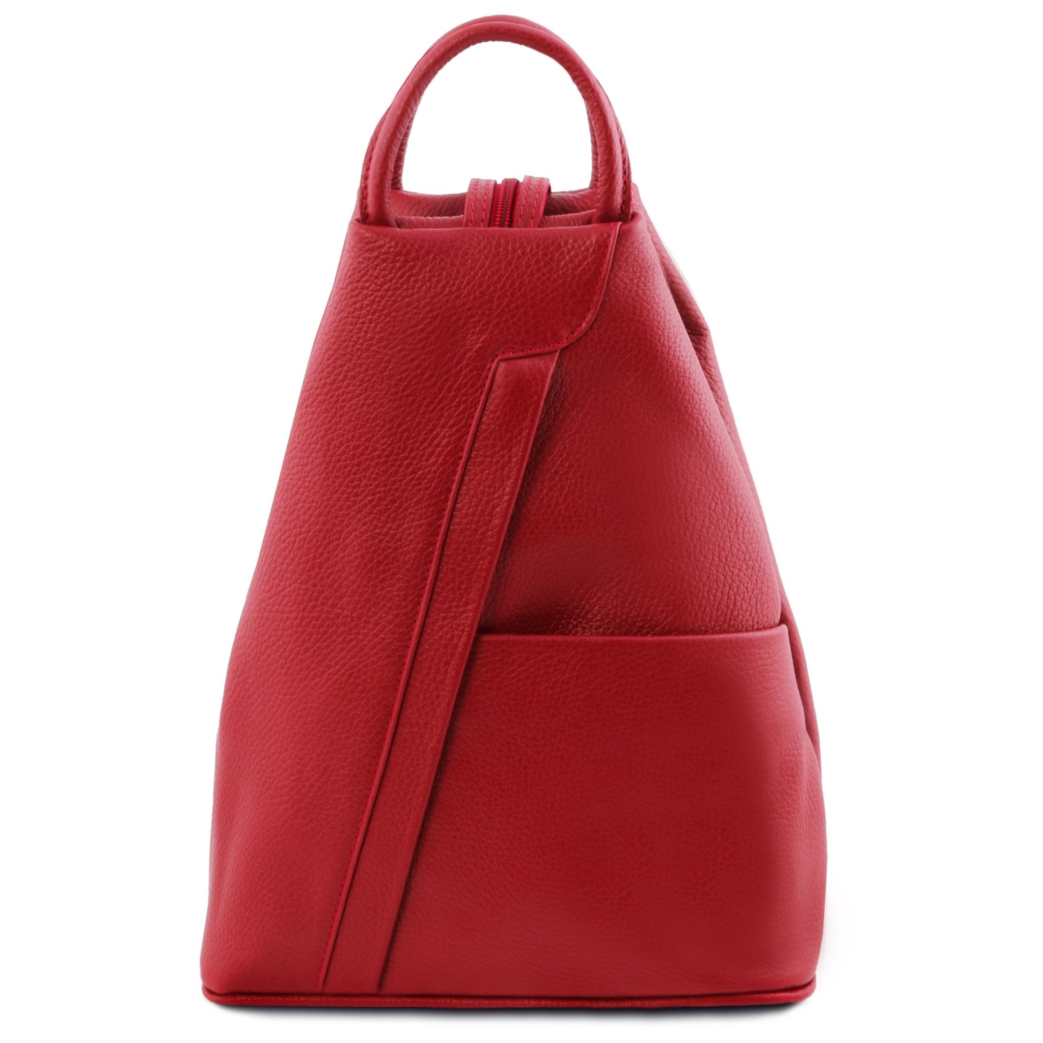 Shanghai Full Grain Leather Backpack in red front view showing front angled zip and open pocket