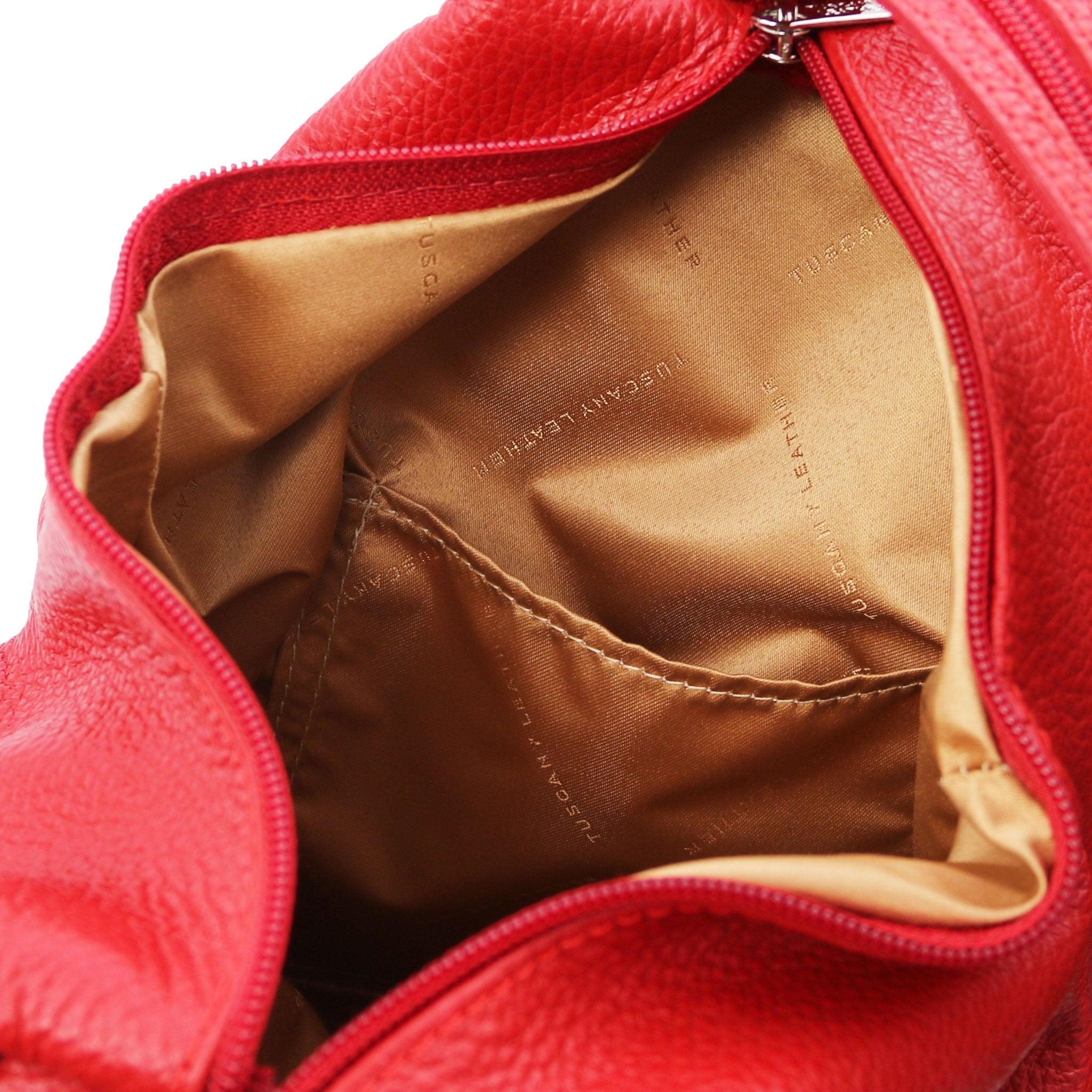 Interior opened pocket view Shanghai Leather Backpack in red showing gold lining