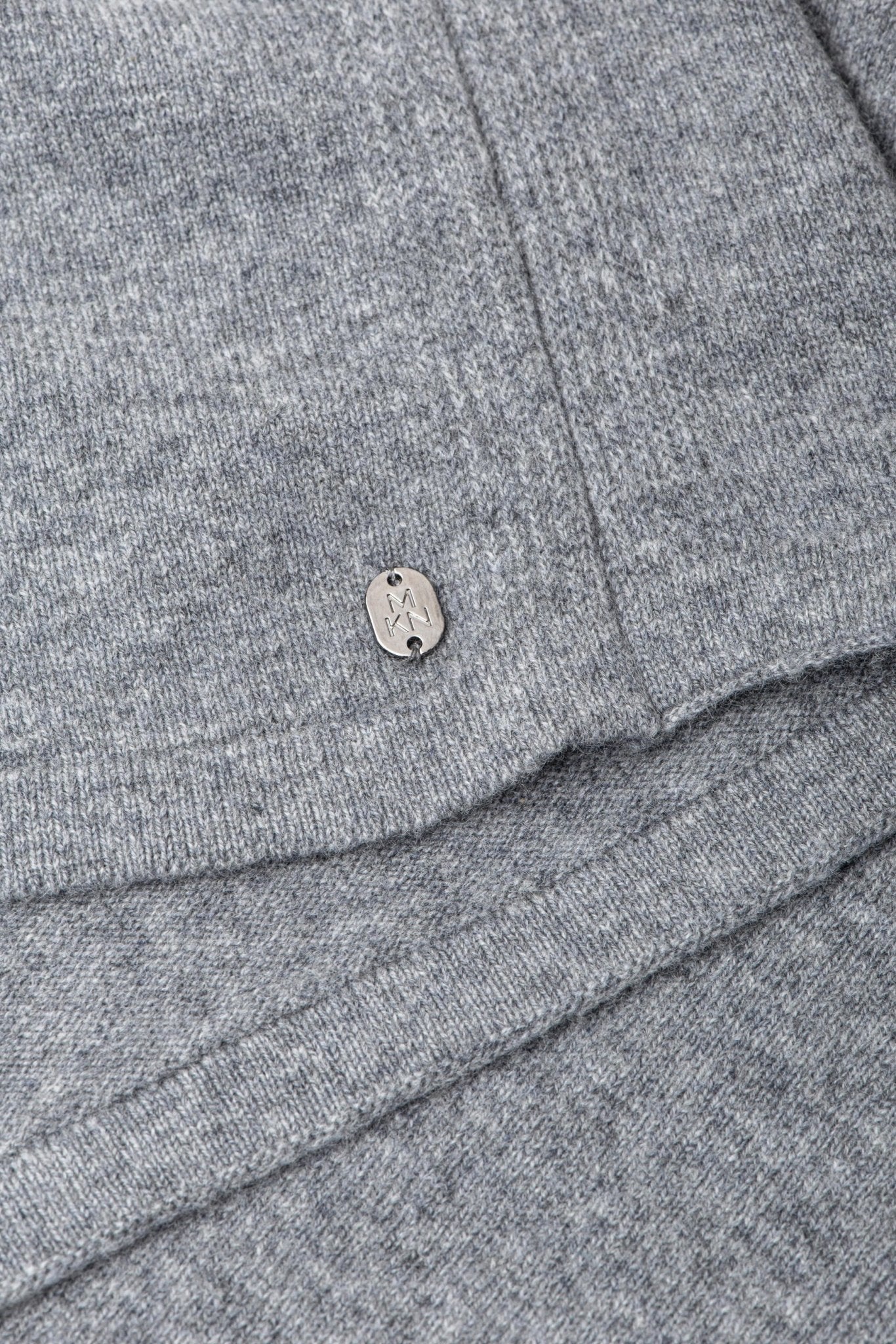 Close up fabric view of the Siena Soft Cashmere Poncho in gray - L'Atelier Global