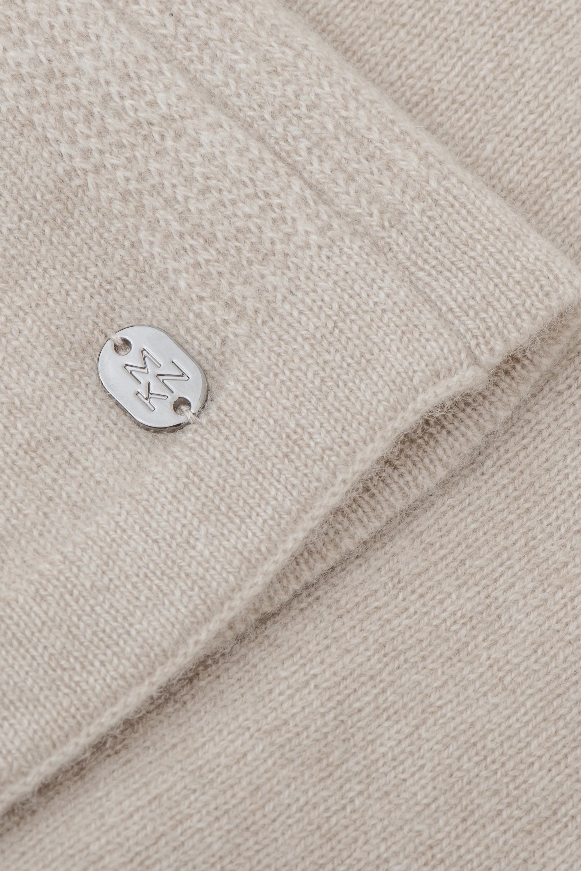 Close up fabric view of the Siena Soft Cashmere Poncho in beige- L'Atelier Global
