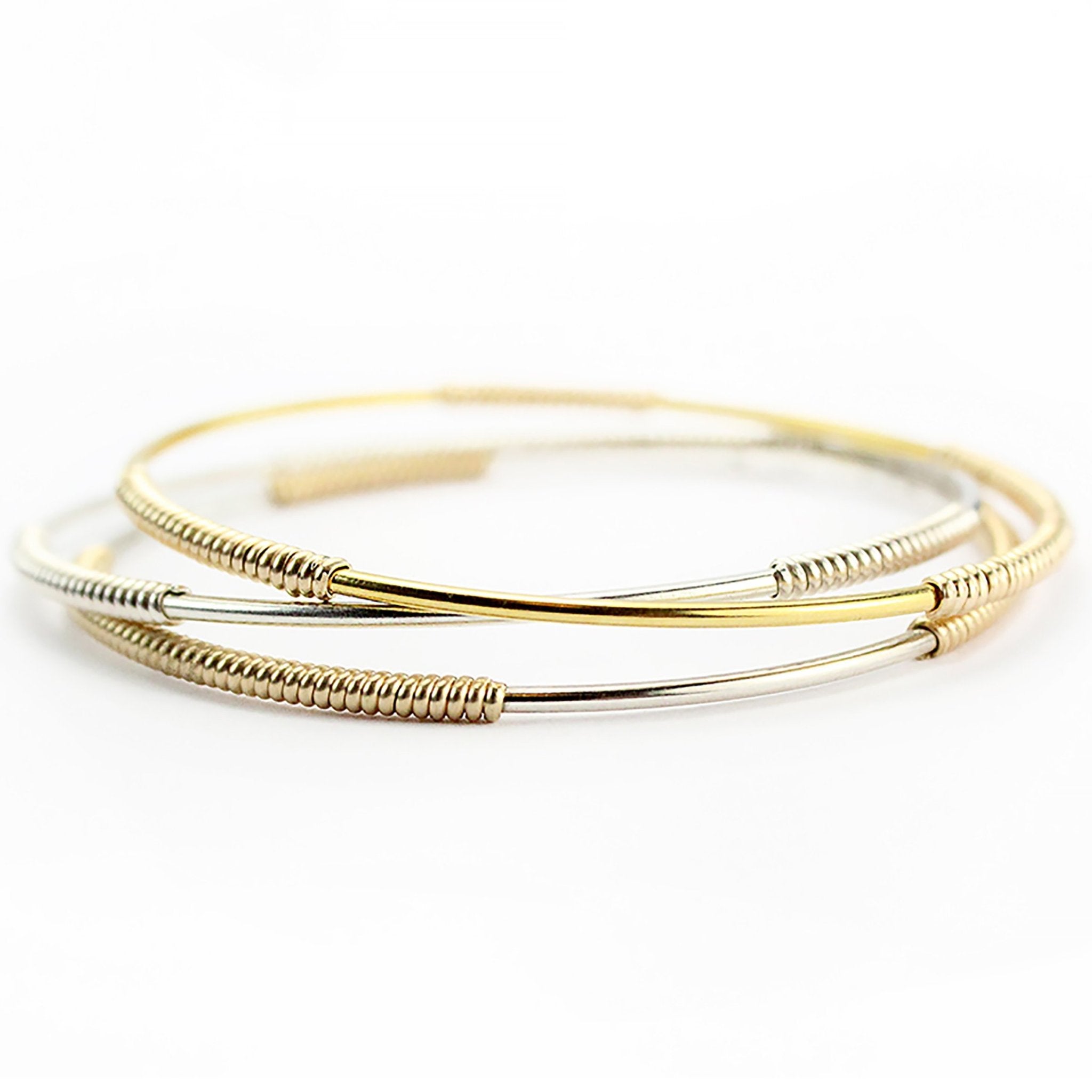 Signature Skinny Bangles on a white background