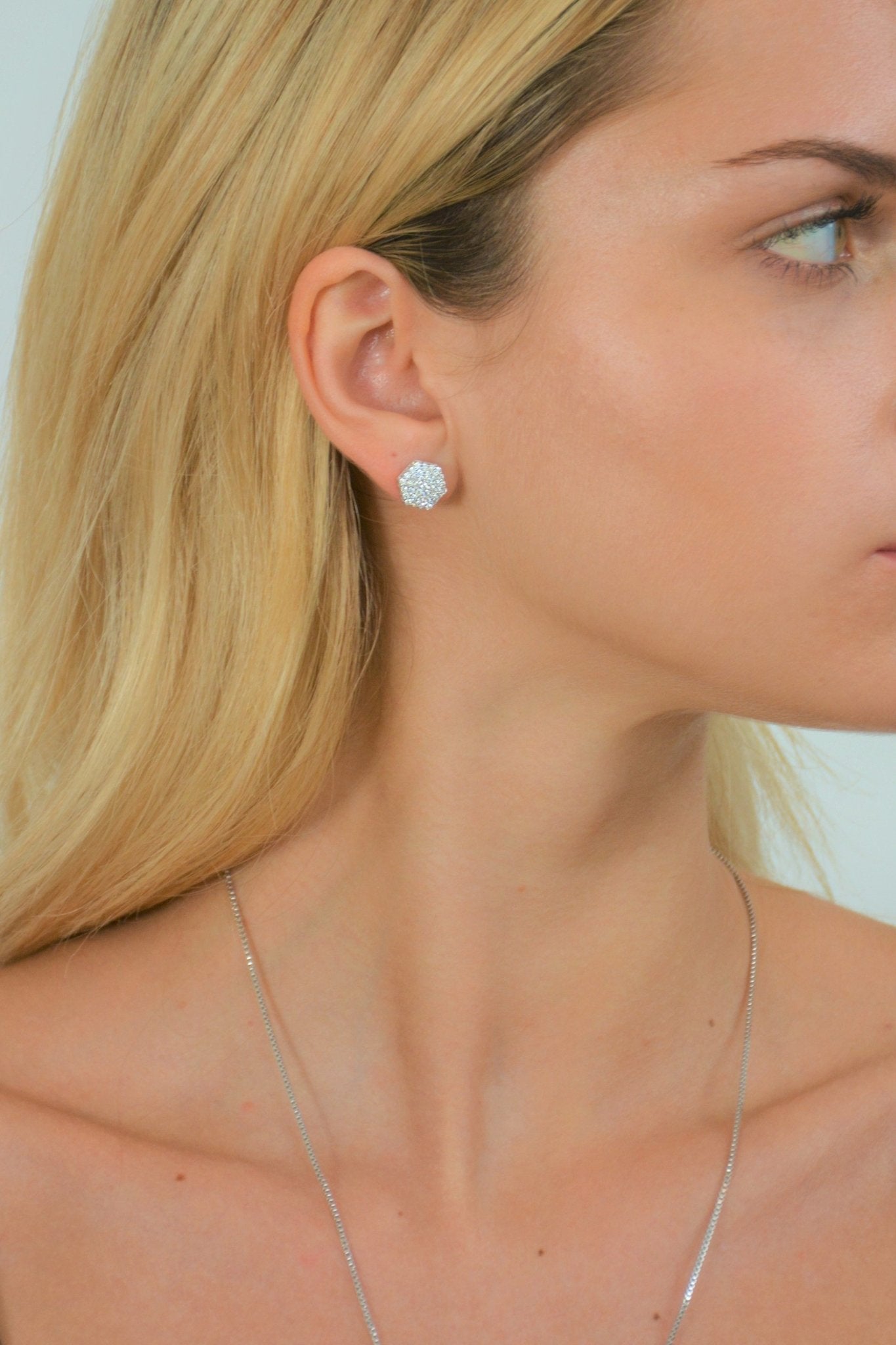 Sterling Silver Dazzle Pave Earrings on a model shown her right ear - L'Atelier Global