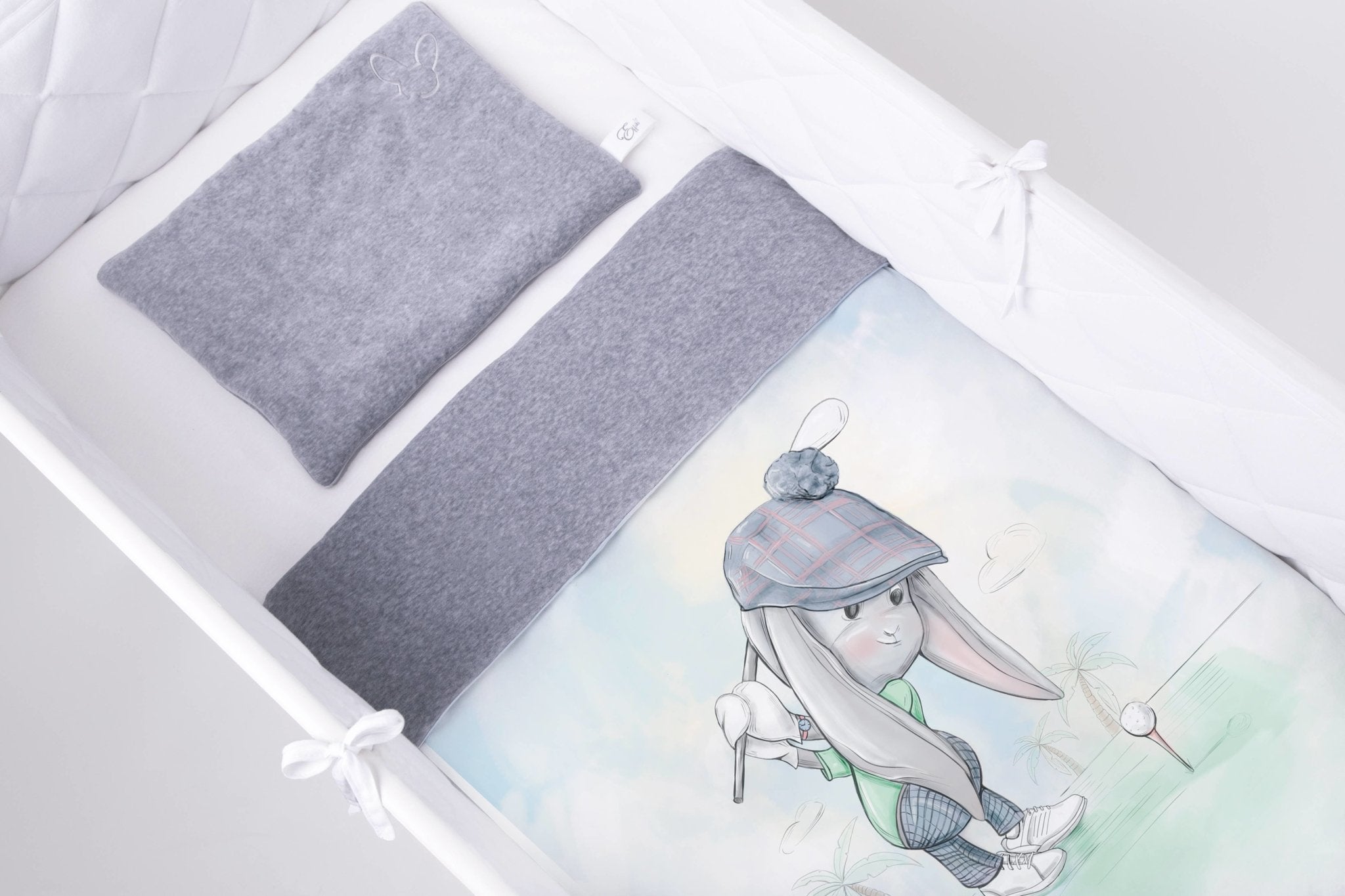 Swing Away Reversible Blanket on a child's bed - L'Atelier Global