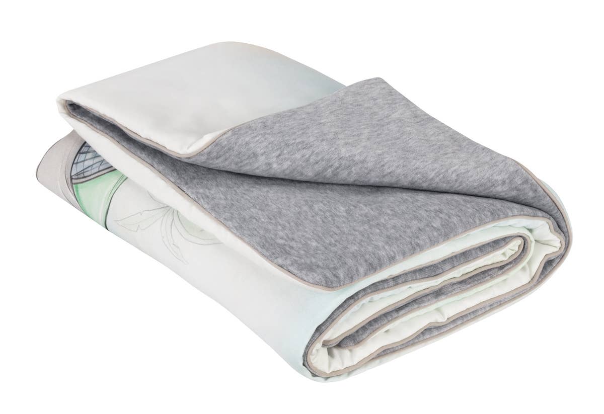 Swing Away Reversible Blanket folded on a white background - L'Atelier Global