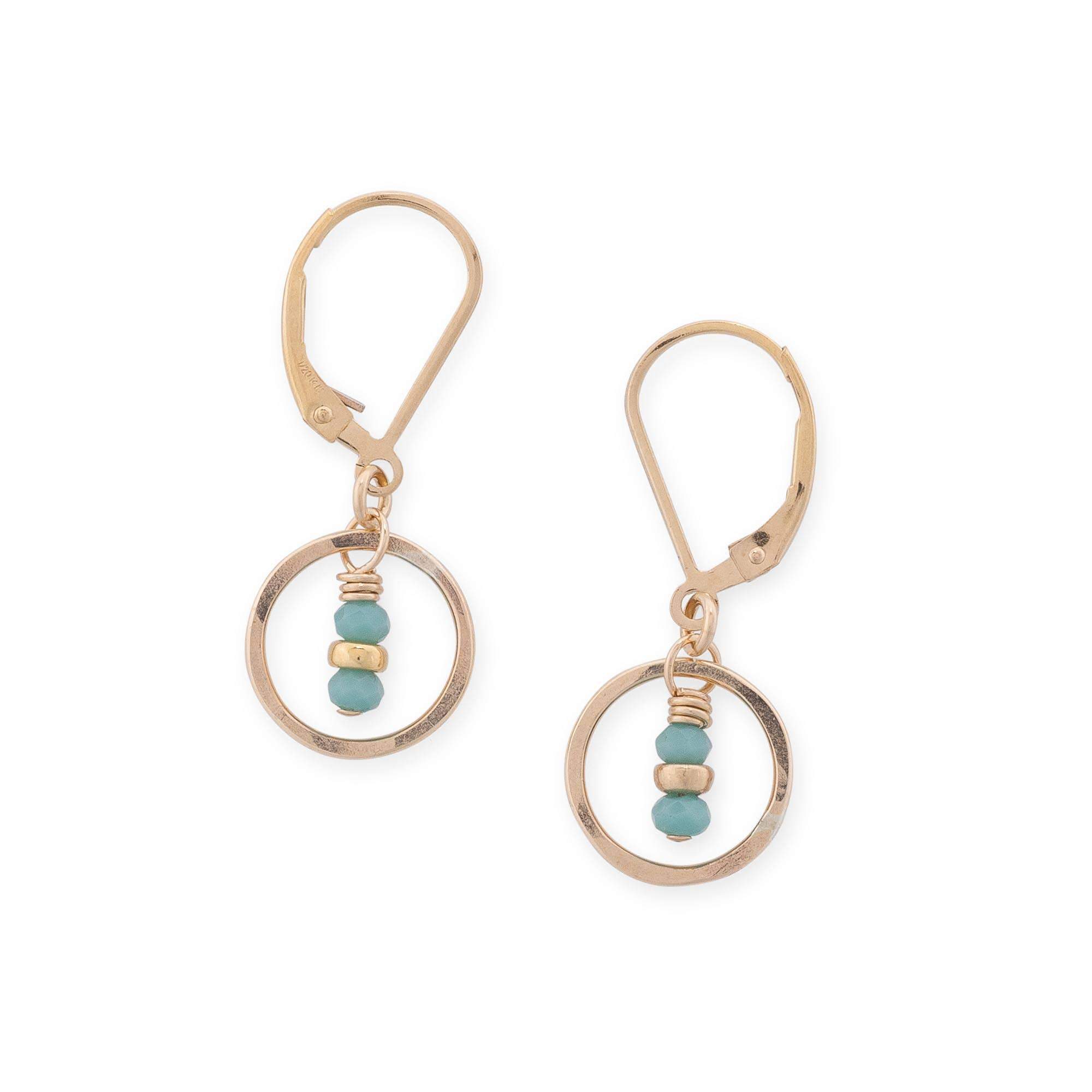 Tiny Gold Circle Earrings with Turquoise Crystals on a white background - L'Atelier Global