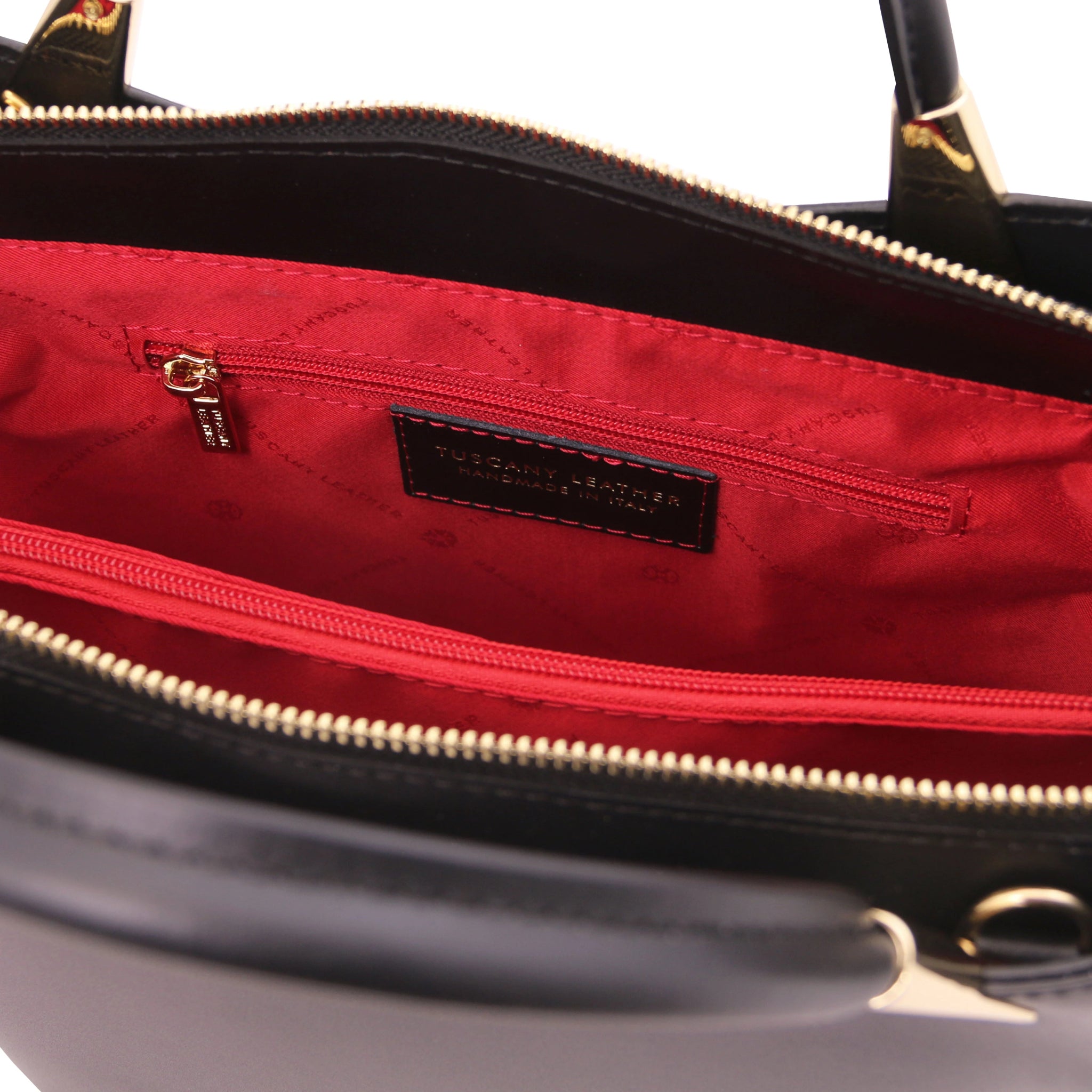 TL Bag Italian Leather Handbag in Black interior view showing centered zippered compartment, red lining and zippered pocket