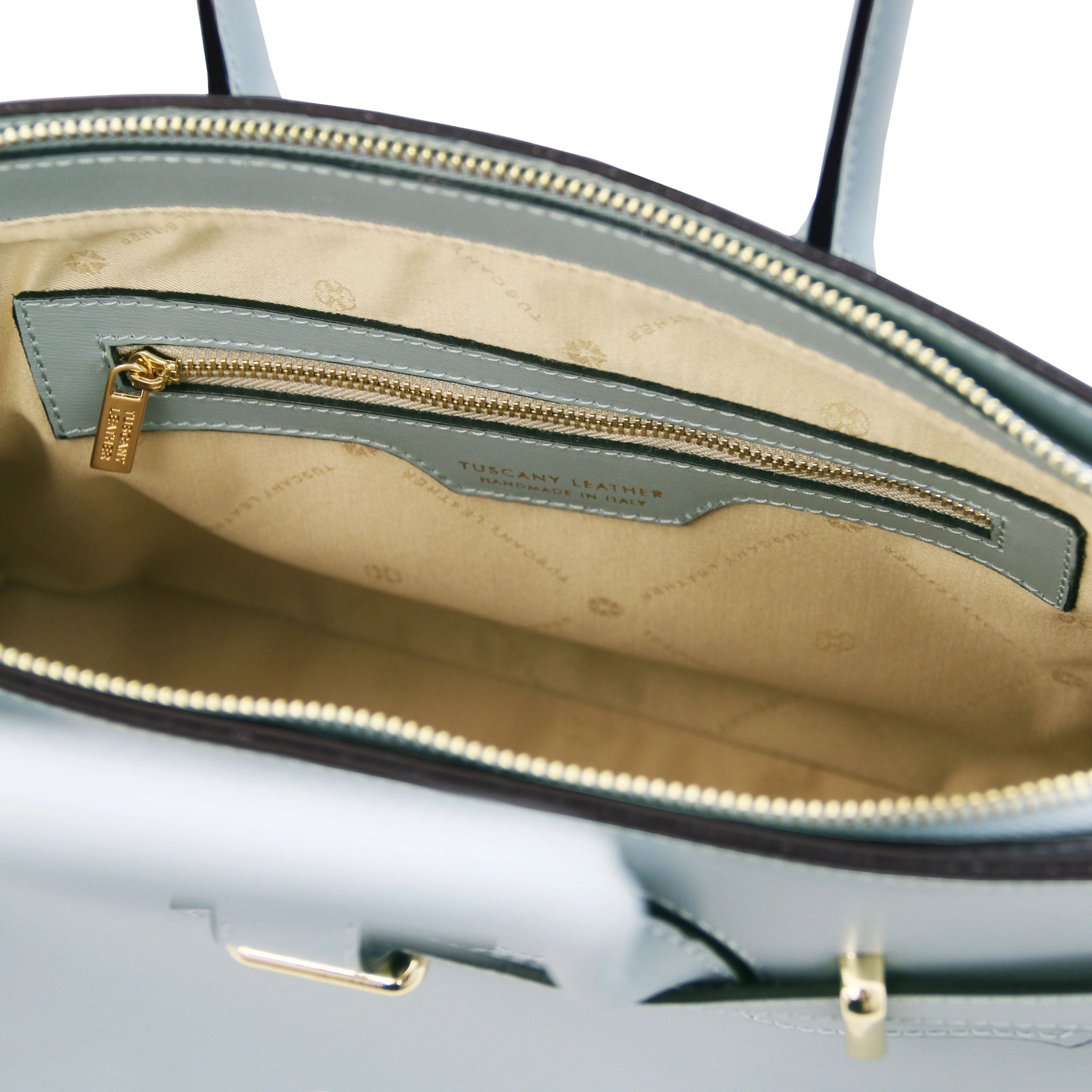 Interior zippered pocket view TL Bag Italian Leather Handbag in Light Blue showing light beige interior