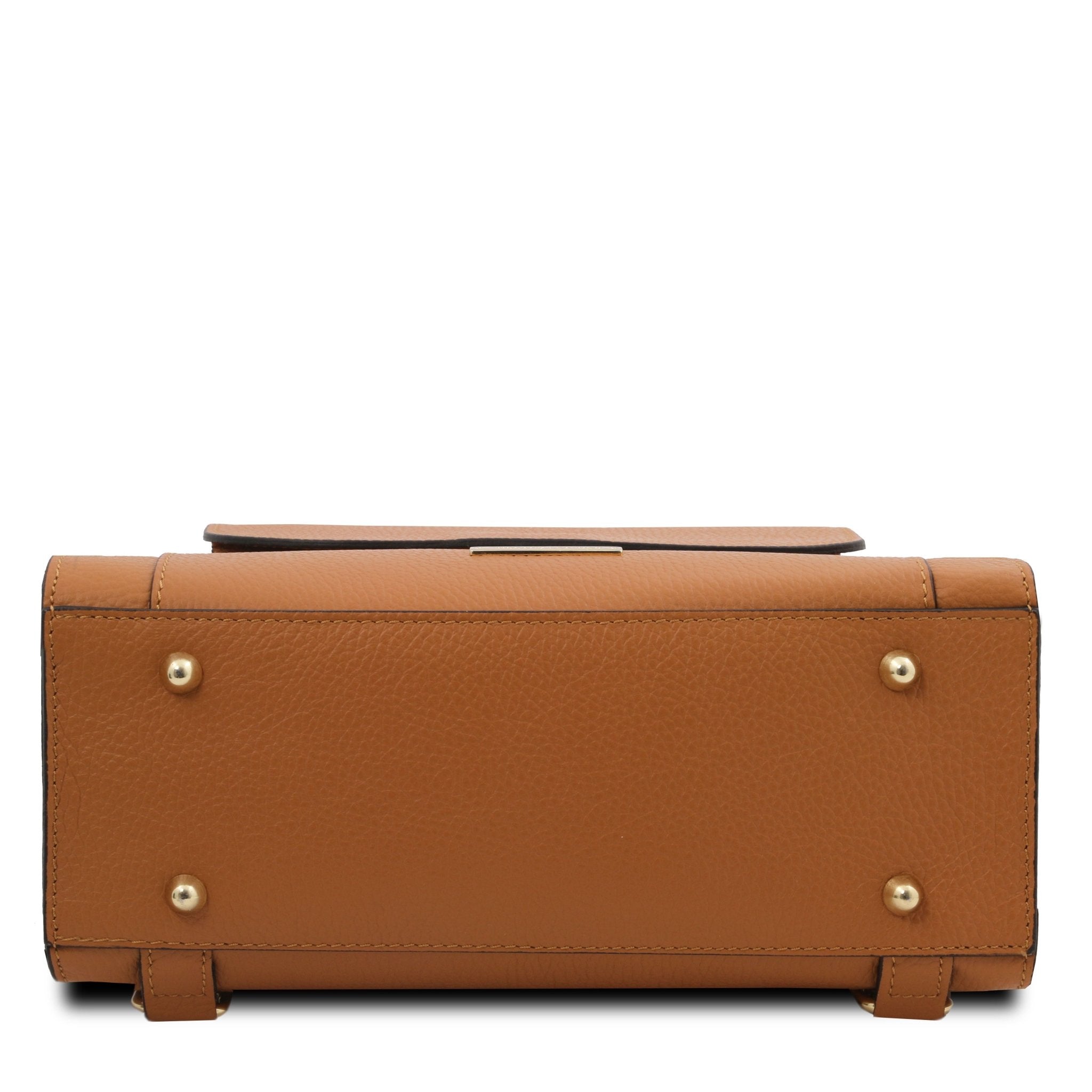 Bottom view TL Bag Leather Backpack in cognac showing protective metal feet on a white background