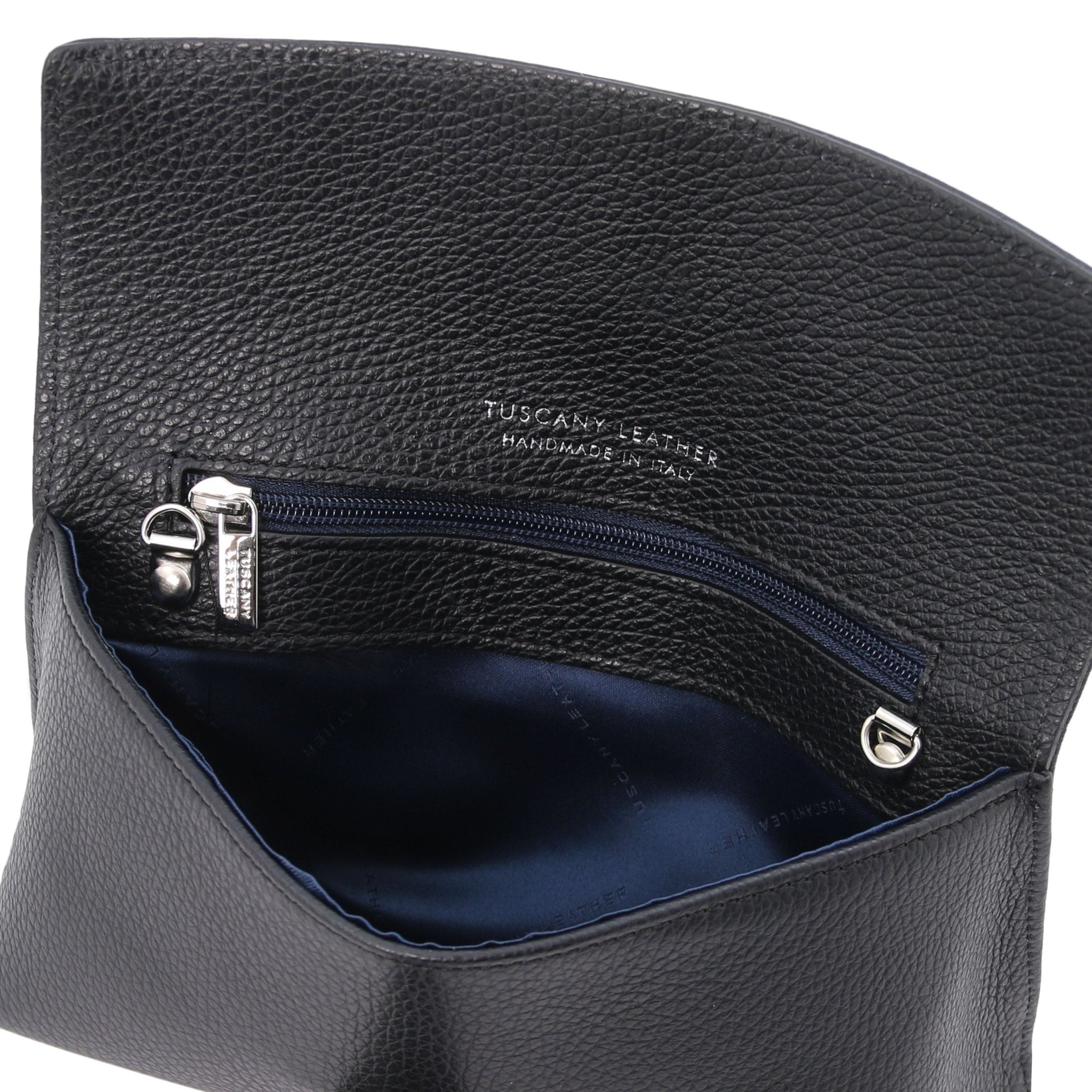 Interior zip pocket view TL Bag Leather Clutch in black showing navy lining