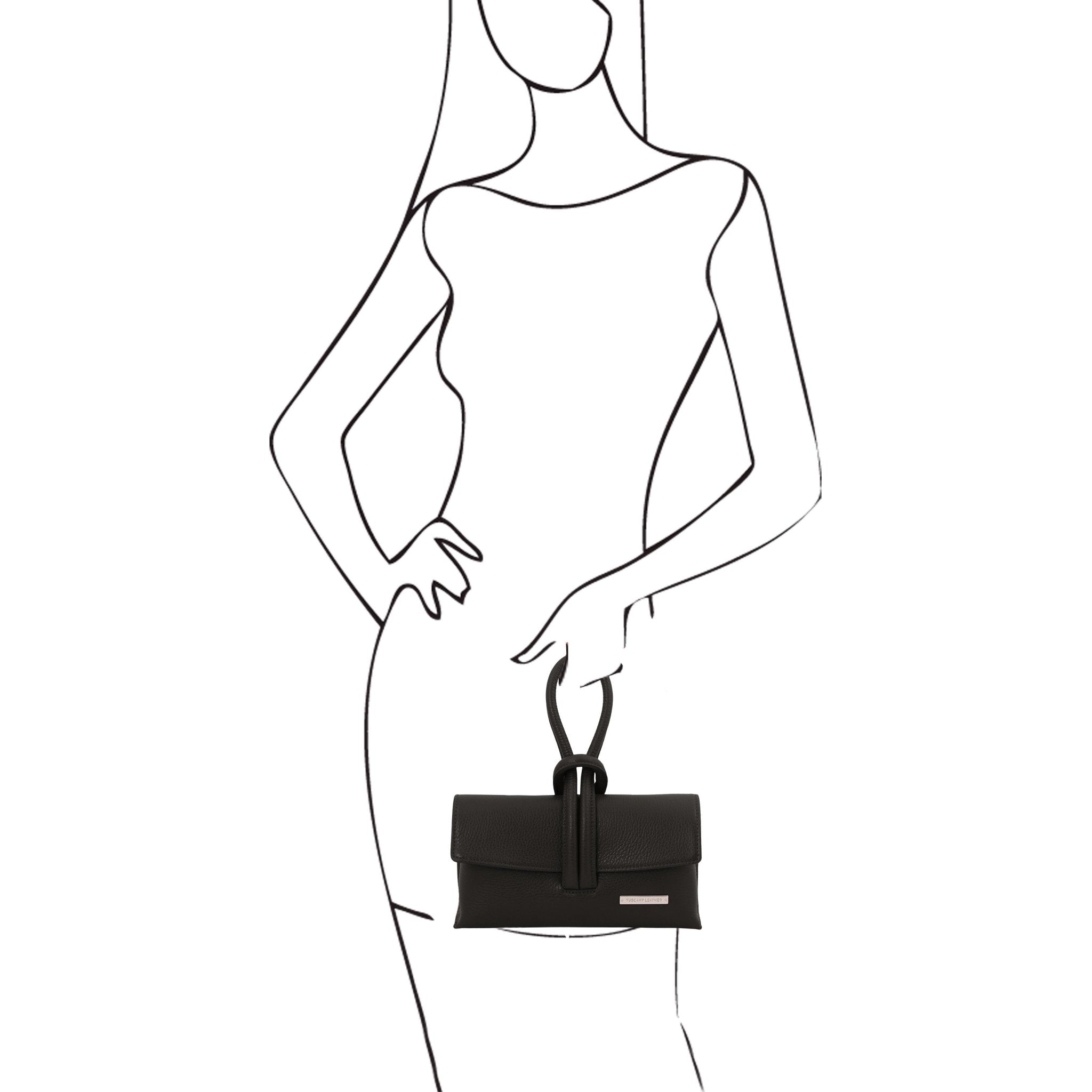 Black and white sketch of female model holding the TL Bag Leather Clutch in black by its top loop handle