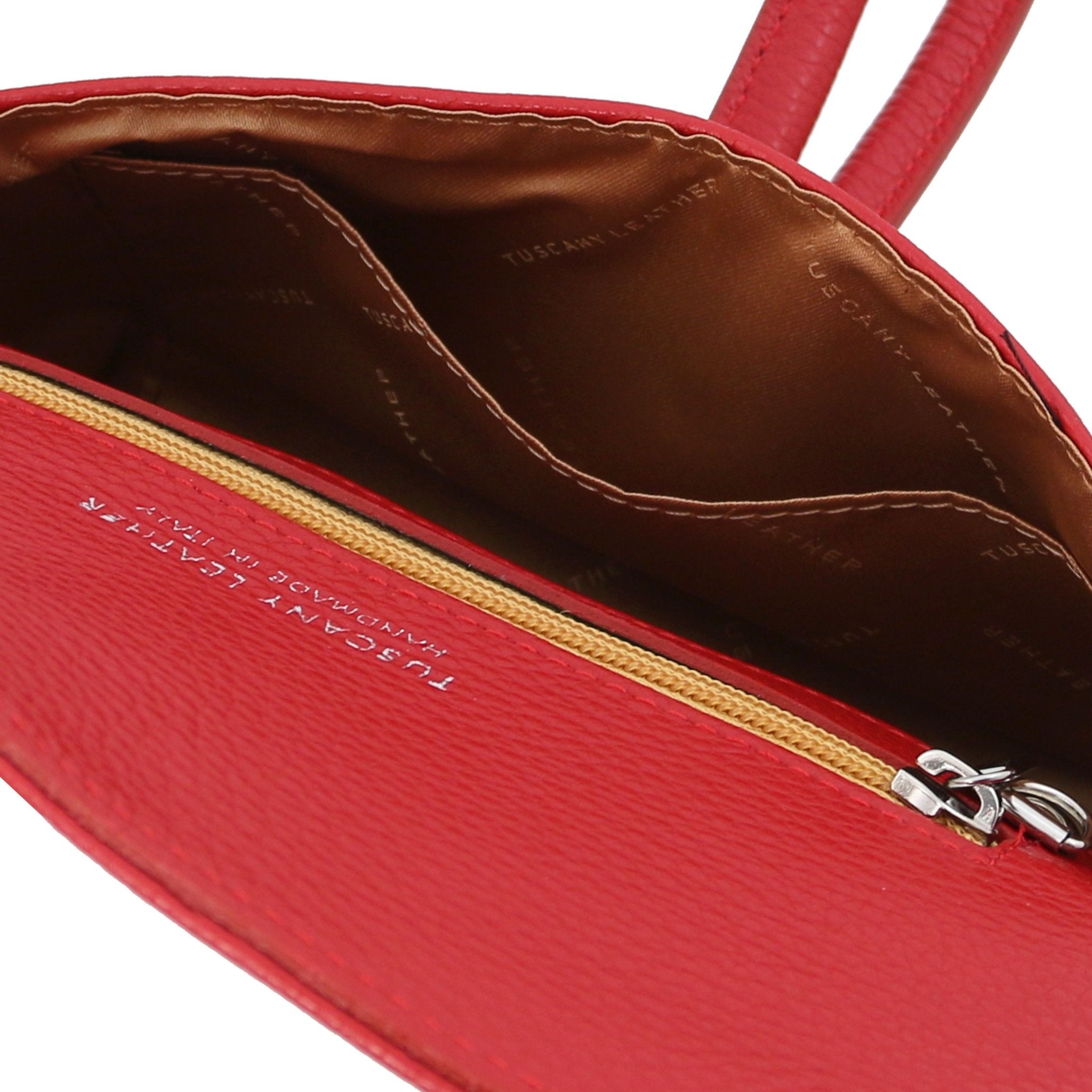 Interior open pocket view TL Bag Leather Clutch in black showing brown lining