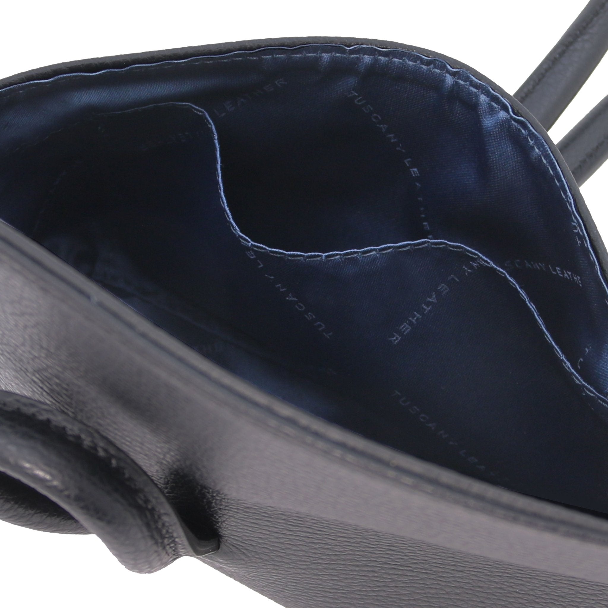 Interior open pocket view TL Bag Leather Clutch in black showing navy lining
