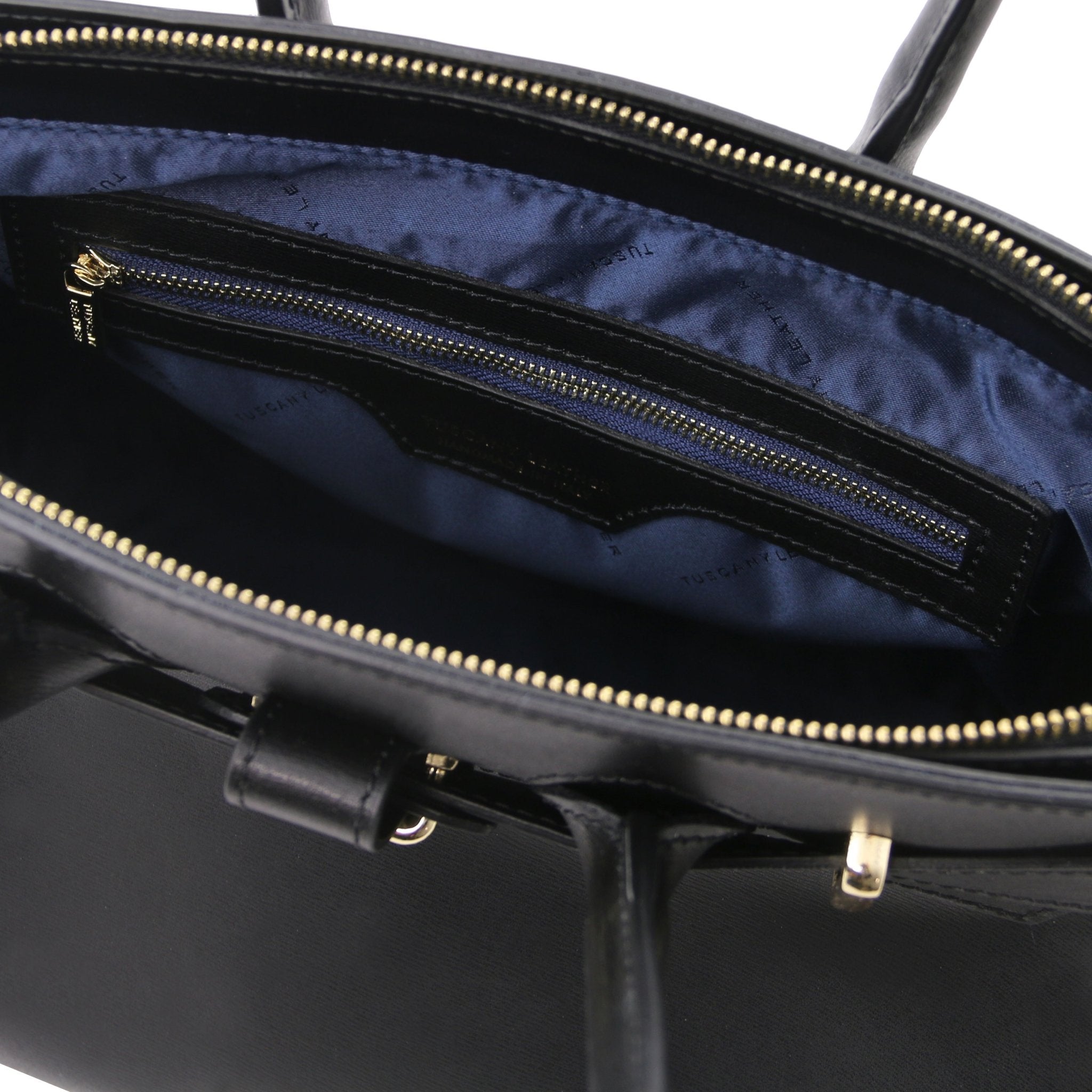 Interior zippered pocket view TL Bag Italian Leather Handbag in Black showing navy interior