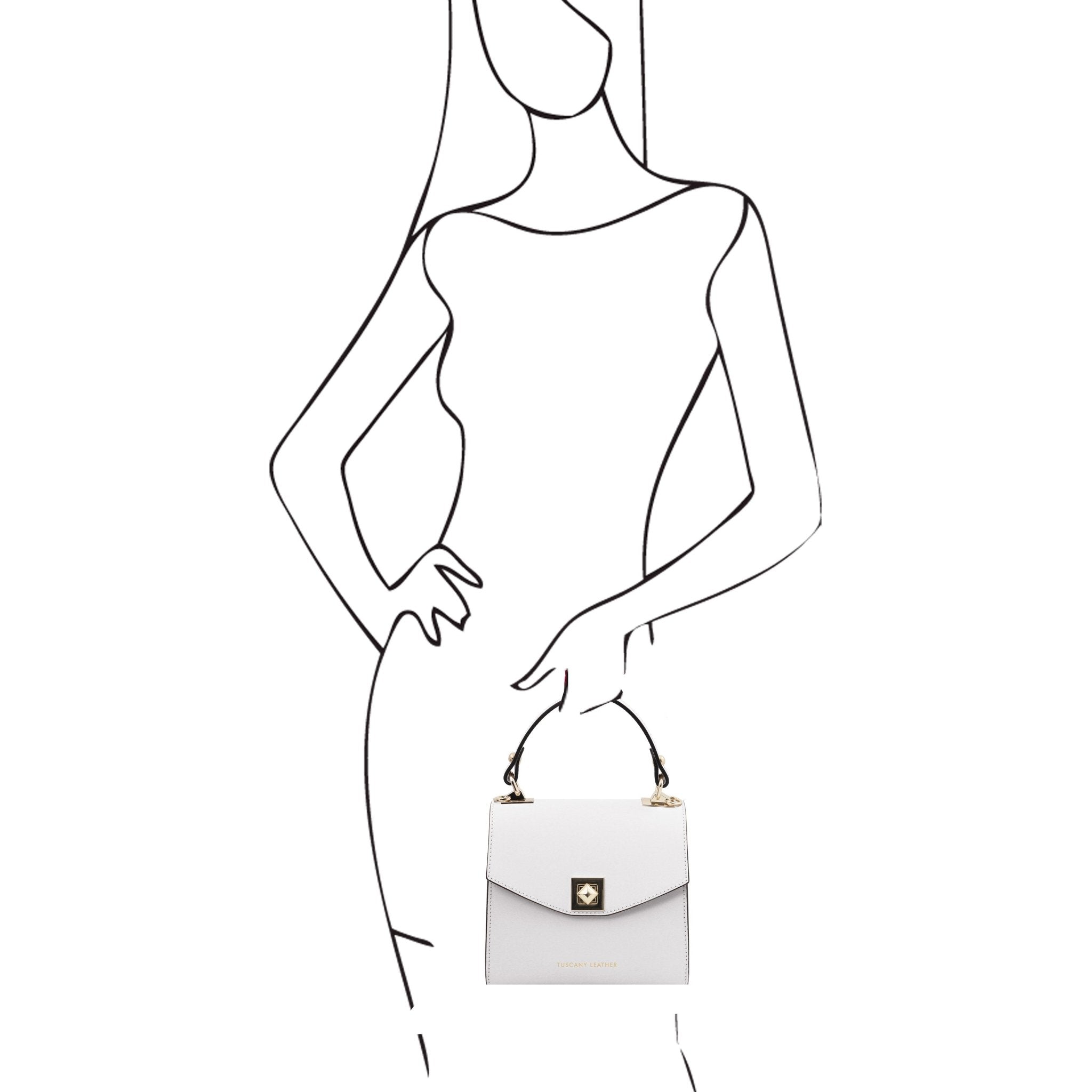 Black sketch on white of a woman holding the TL Bag Italian Leather Mini Bag in white in her hands