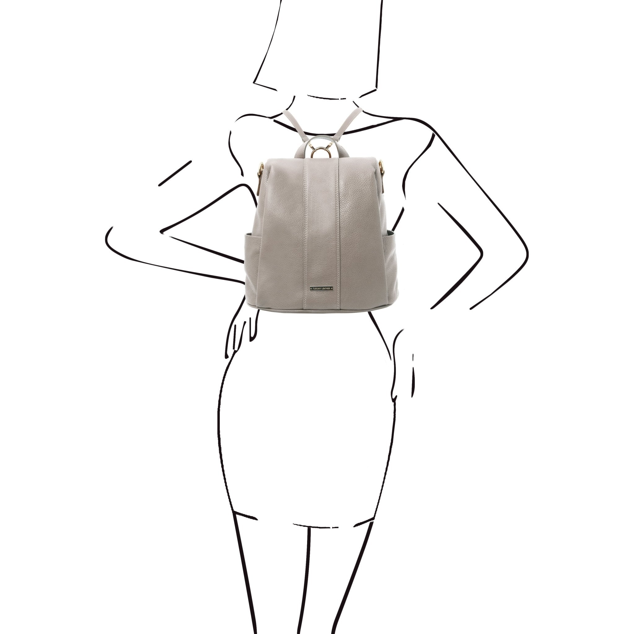 Black and white sketch woman wearing the TL Bag Soft Leather Backpack in light gray