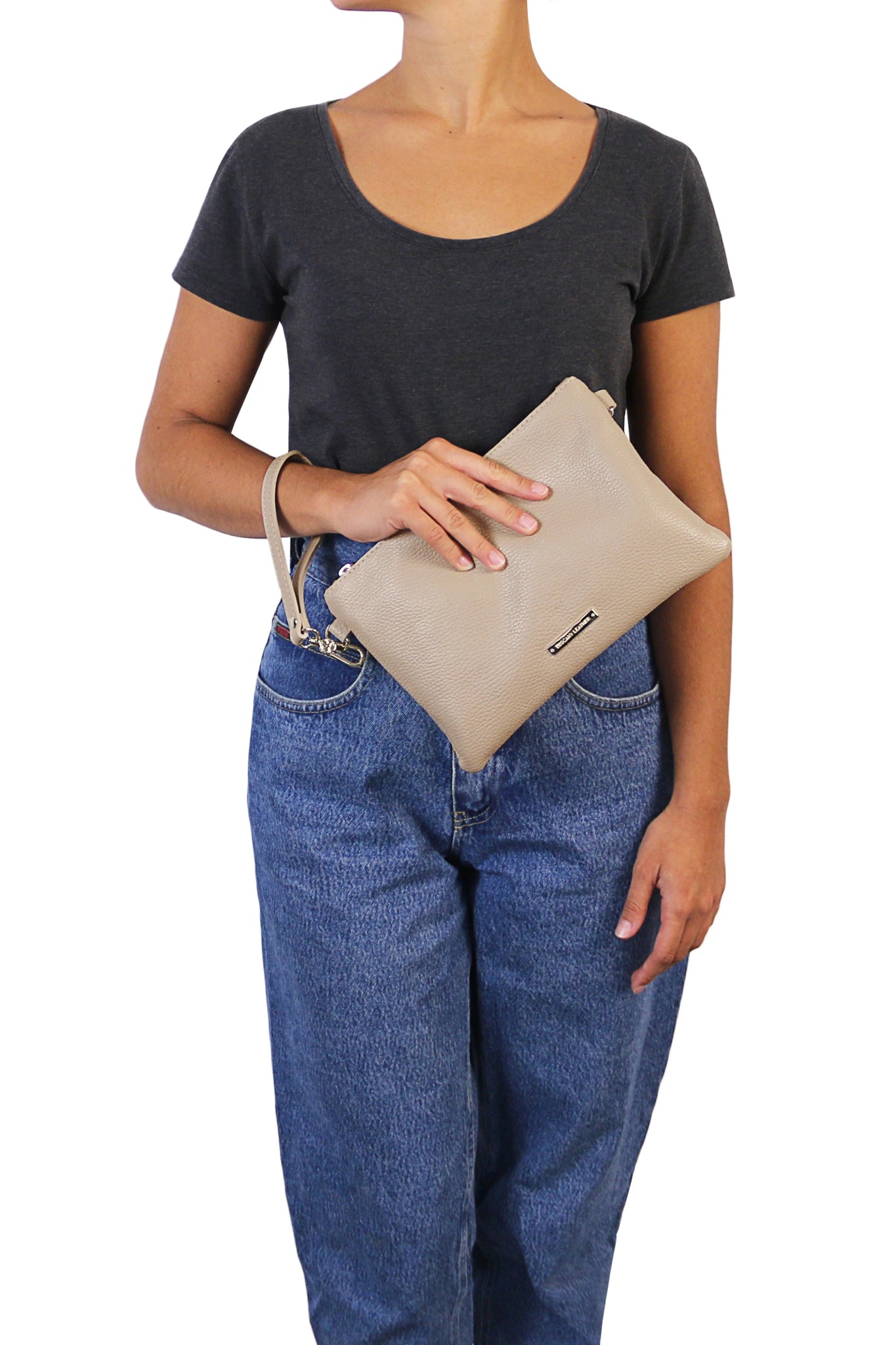 TL Bag Soft Leather Clutch in Light Taupe with Hand Strap on Model on White Background- L'Atelier Global