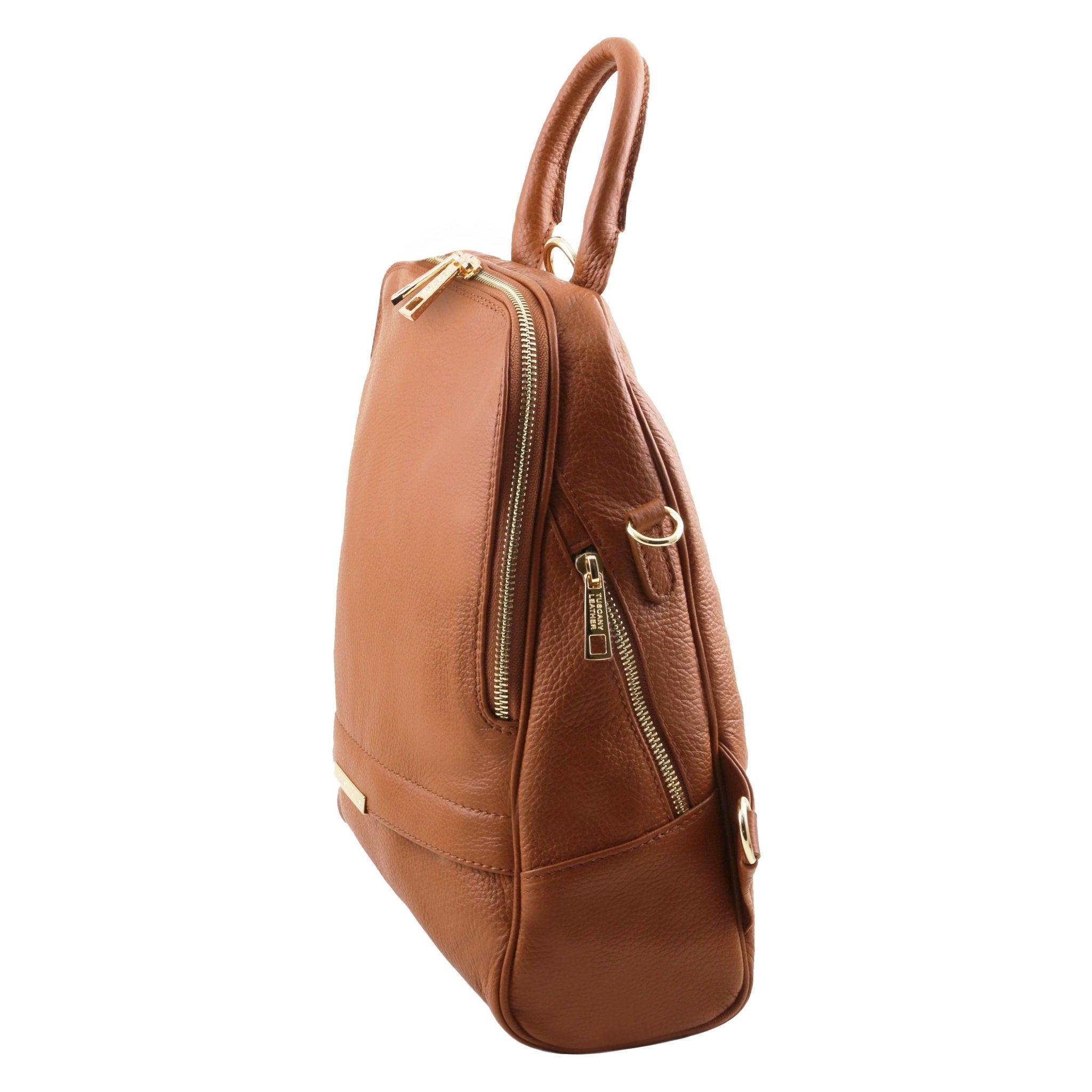 Side view of TL Bag Soft Leather Backpack in cognac showing side zip pocket and main zip entry