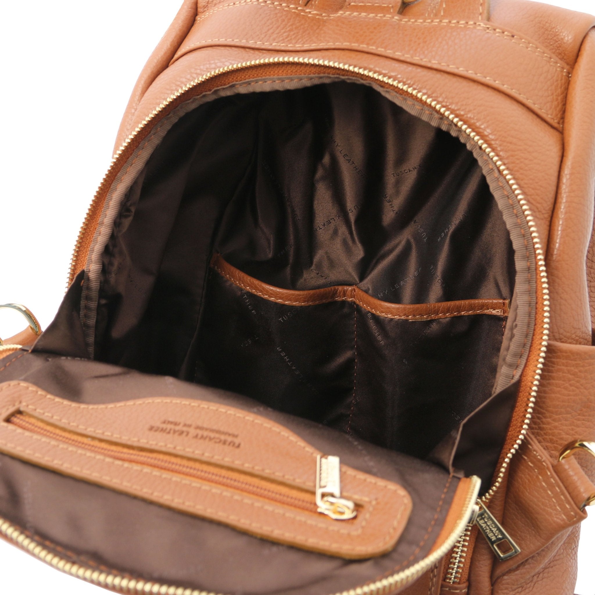 TL Bag Soft Leather Backpack in cognac showing Front exterior zip compartment two open and one zipper pockets, with brown lining