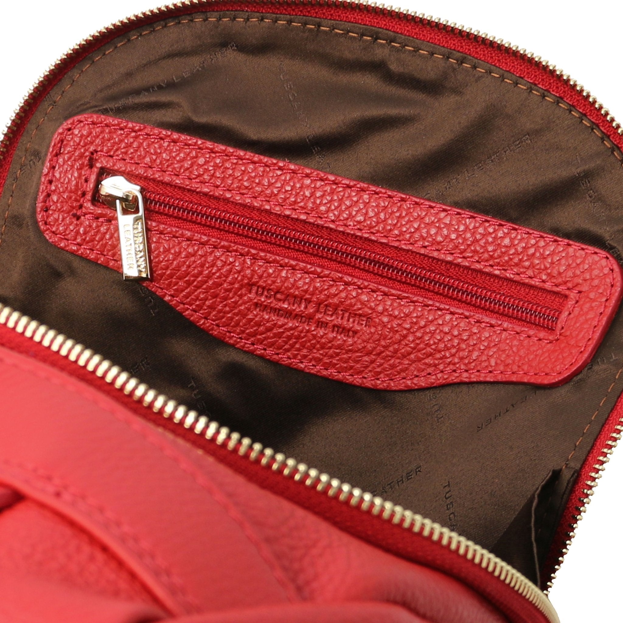 TL Bag Soft Leather Backpack in red showing interior zip pocket and dark brown lining, with brown lining