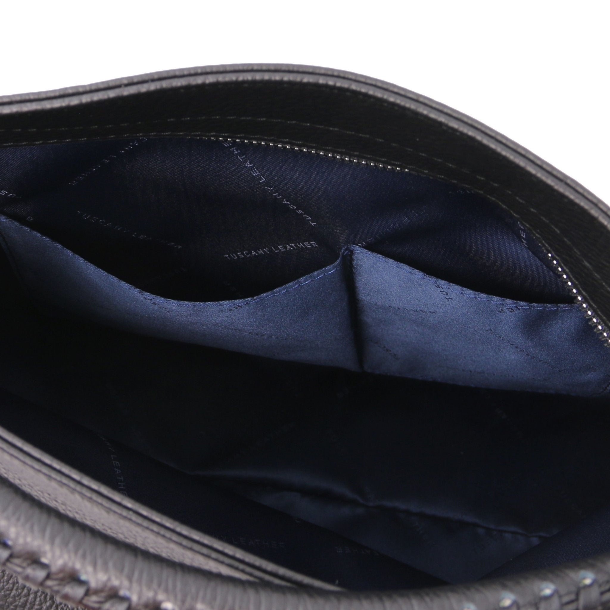 Interior view of the TL Bag Soft Leather Handbag in Black showing two opened pockets and navy lining on a white background.