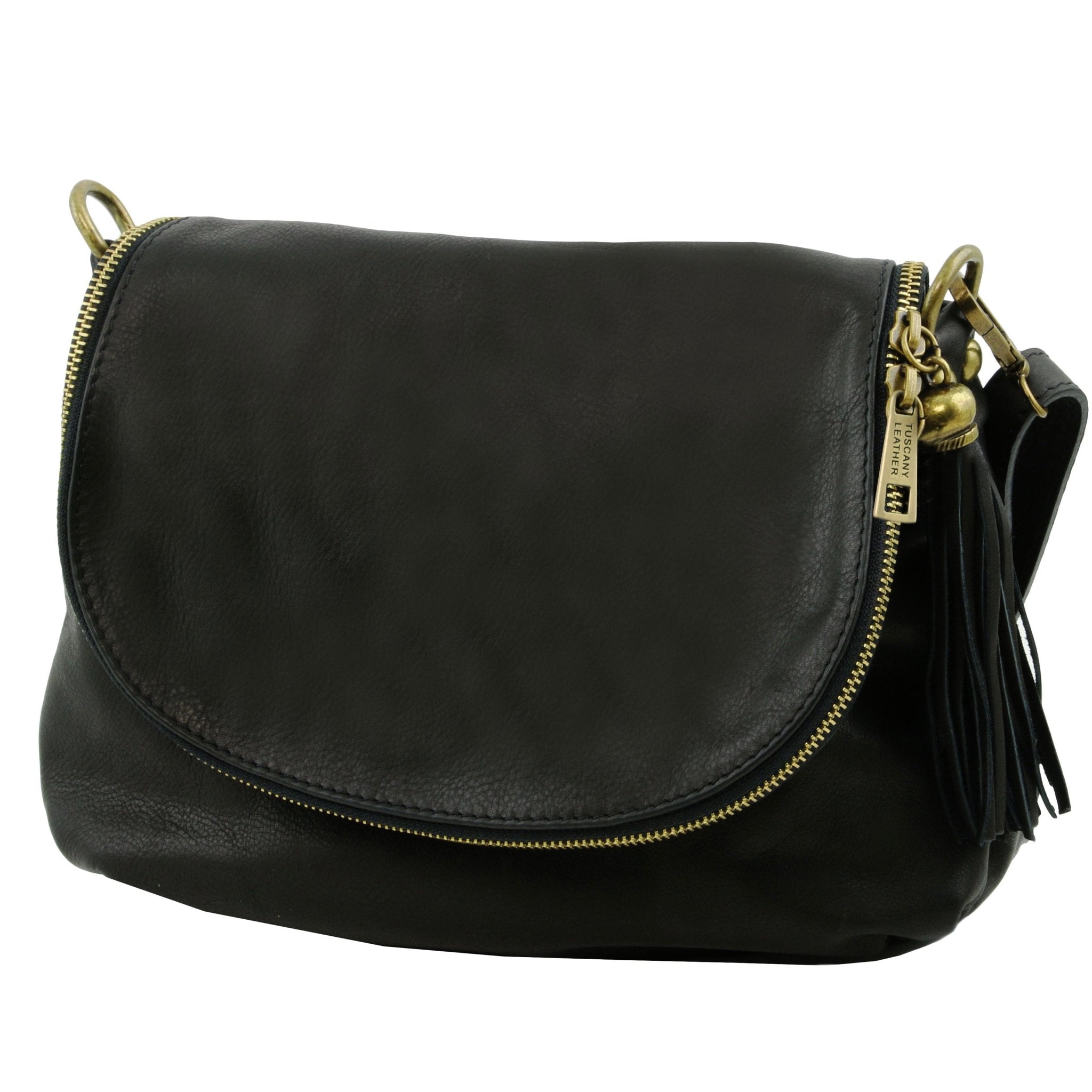 Side view TL Bag Soft Leather Shoulder Bag with Tassel Detail Small Size in black showing zippered flap cover, tassel and burnished gold hardware
