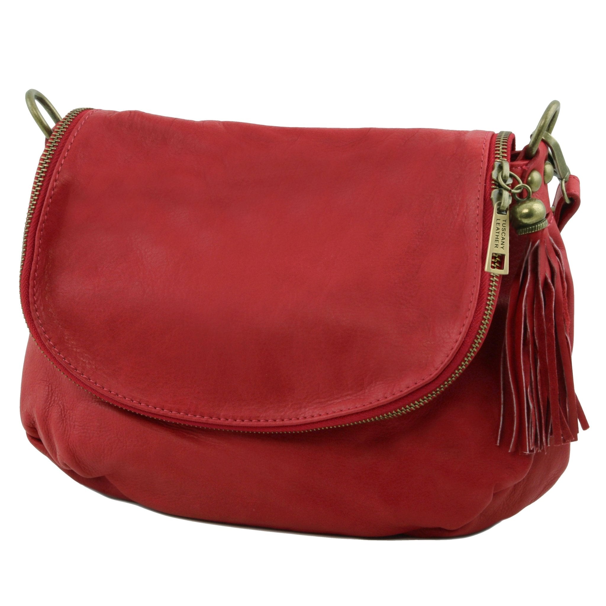 Side view TL Bag Soft Leather Shoulder Bag with Tassel Detail Small Size in red showing zippered flap cover, tassel and burnished gold hardware