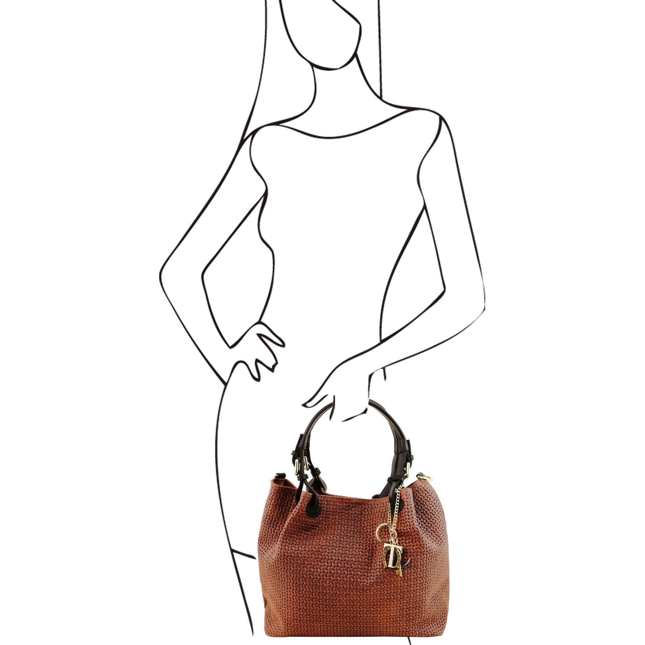 Black and white sketch of woman holding the TL Keyluck Woven Printed Leather Shopping Bag