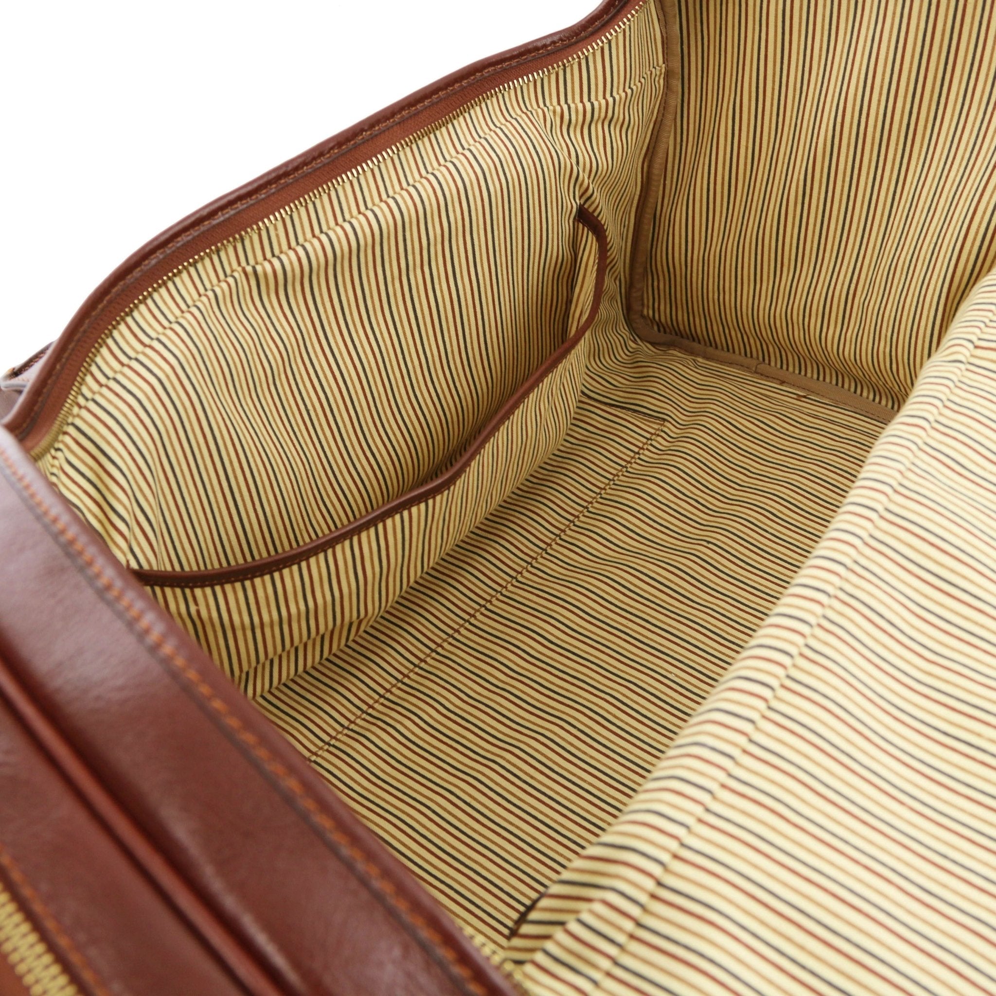 Interior view TL Voyager Travel Leather Bag with Side Pockets in brown showing opened pocket and vintage striped lining
