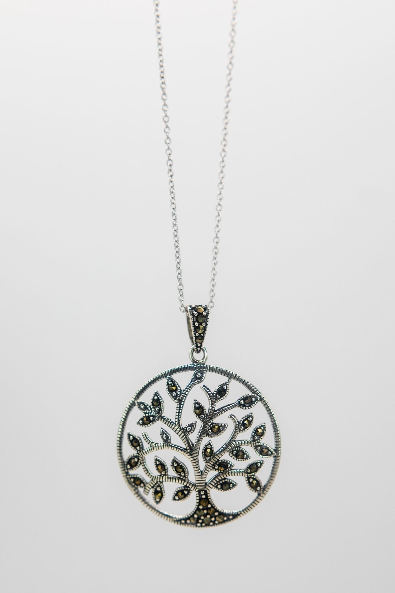 Tree of Life Sterling Silver Necklace hanging on a white background- L'Atelier Global