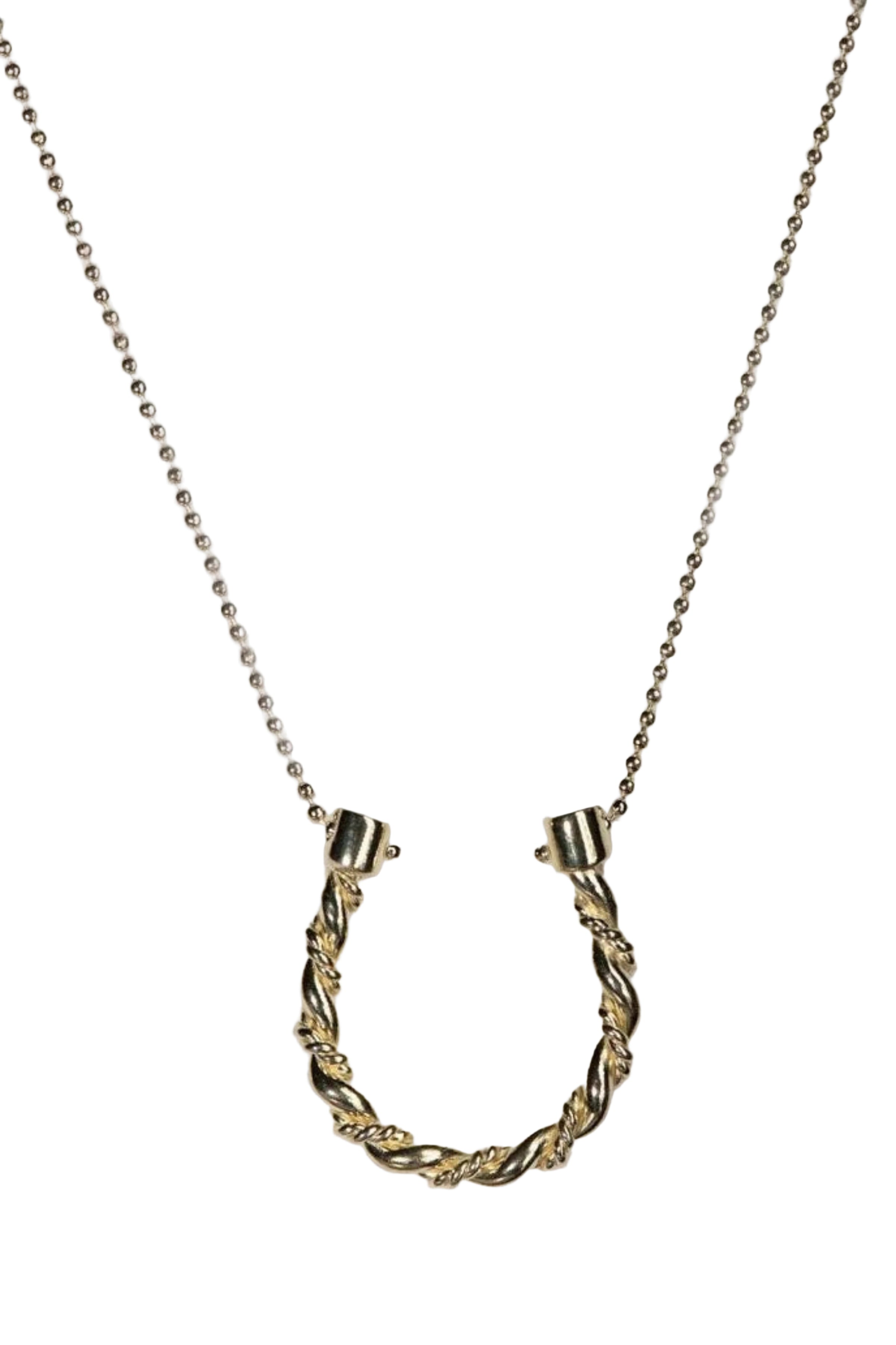 Triple Twist Lariat Horseshoe Necklace in Gold on a white lustrous background