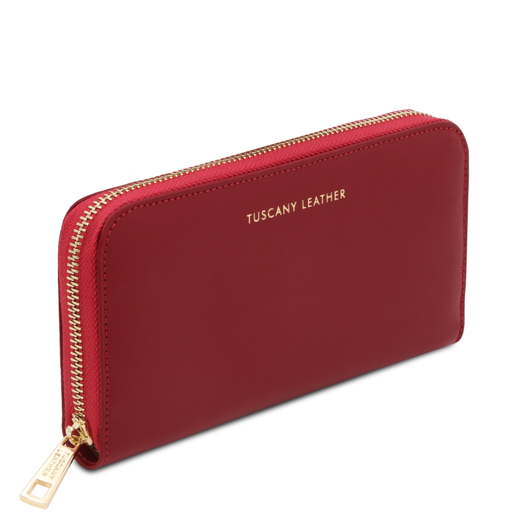 Side front angled view Venere Exclusive Leather Accordion Wallet in red, featuring a gold zipper and Tuscany Leather gold branding at the top center, set against a white background.