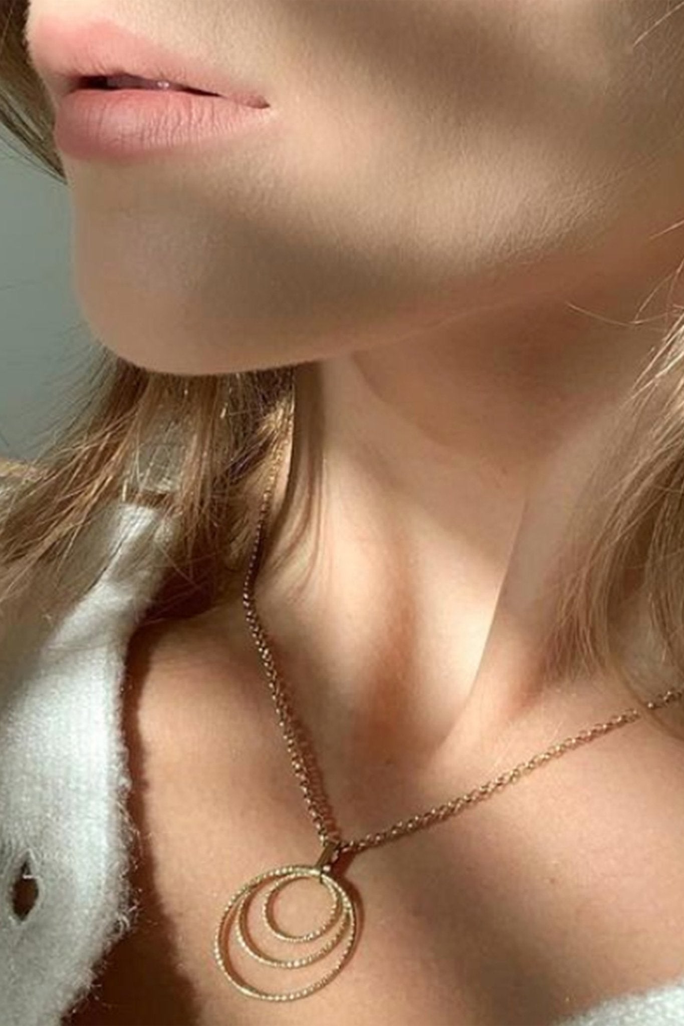 Vincenze Circle Trio Necklace in gold on female model - L'Atelier Global