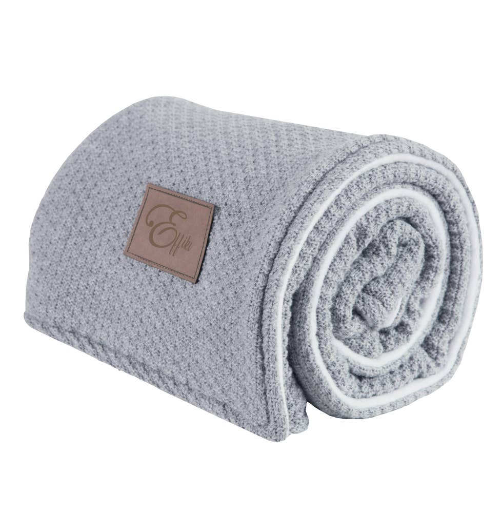 Wool & Fleece Double Blanket rolled up on a white background - L'Atelier Global