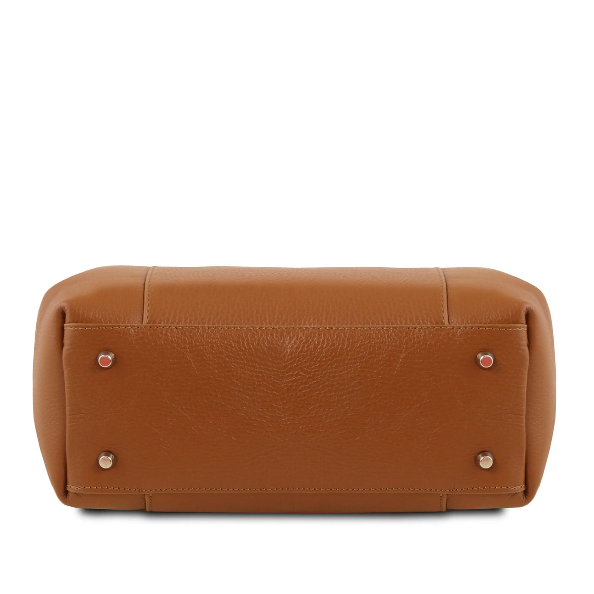 Bottom view cognac leather handbag with silver protective feet on a white background