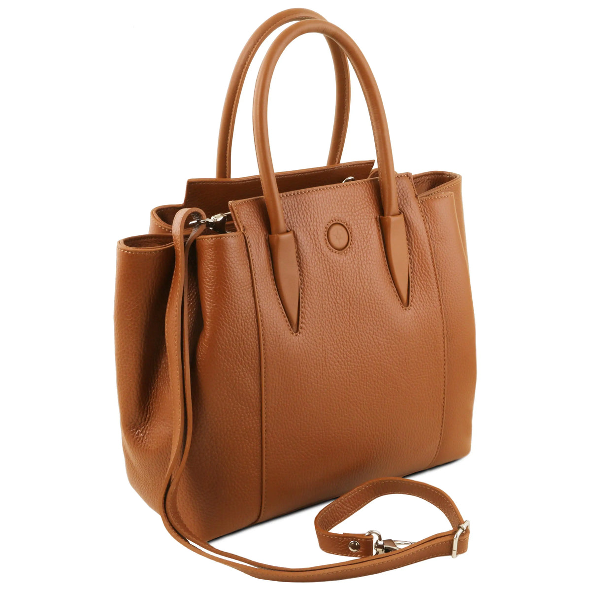 Cognac leather handbag with a shoulder strap on a white background