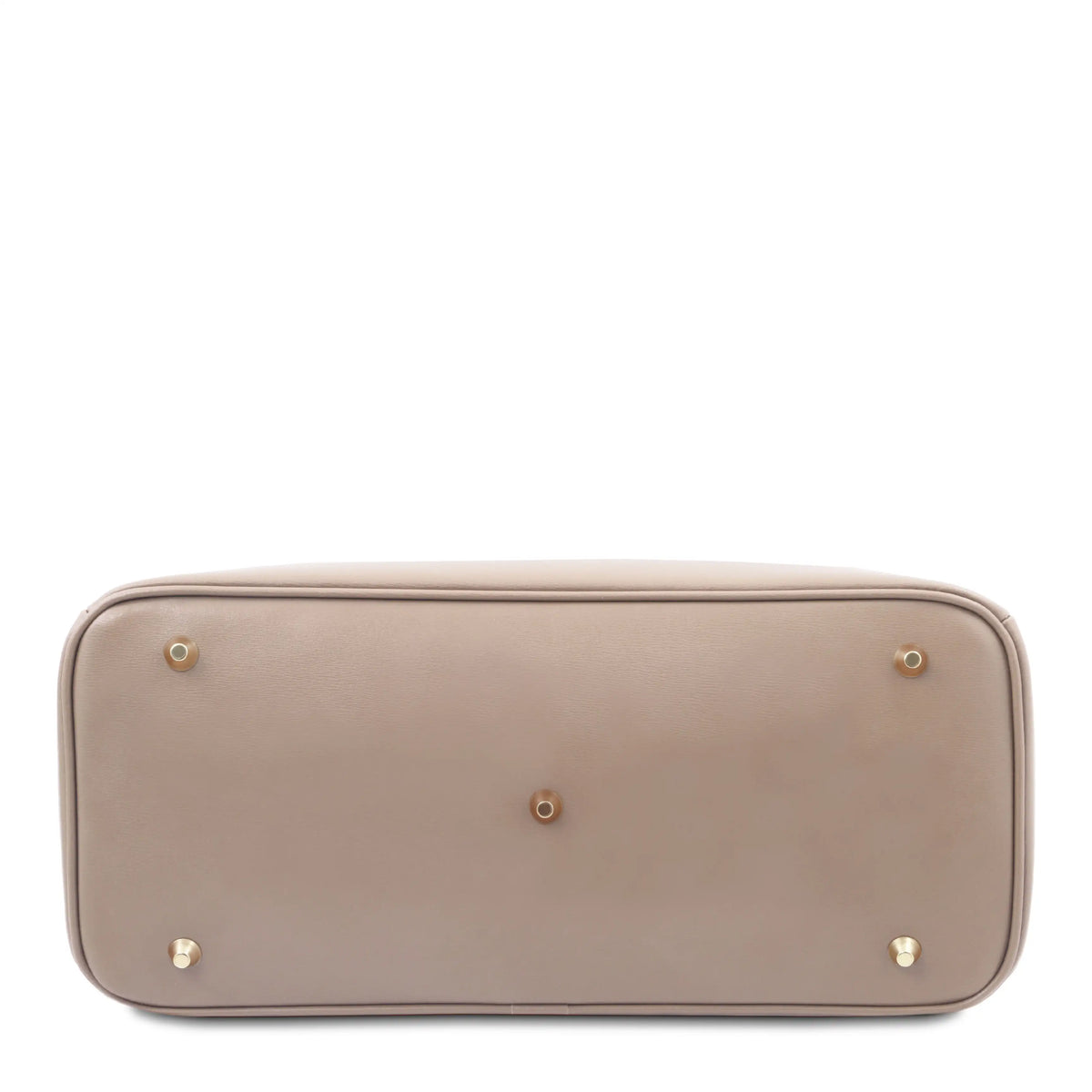 The bottom base of a taupe leather handbag, featuring four brass grommets and a central brass rivet, photographed against a solid white background.