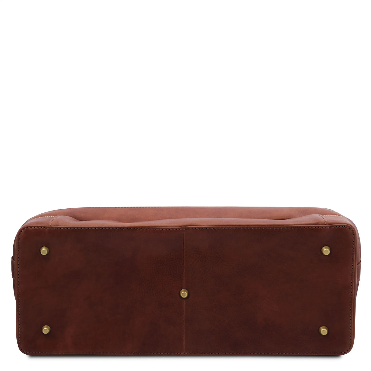 Bottom view of brown leather doctor bag with gold protective studs on a white background
