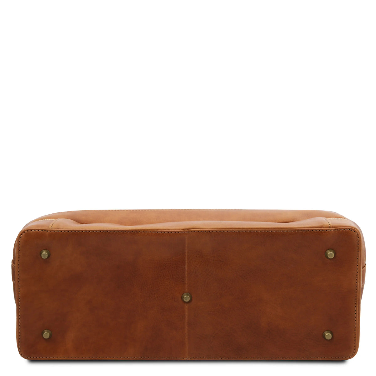 Bottom view of natural leather doctor bag with gold protective studs on a white background