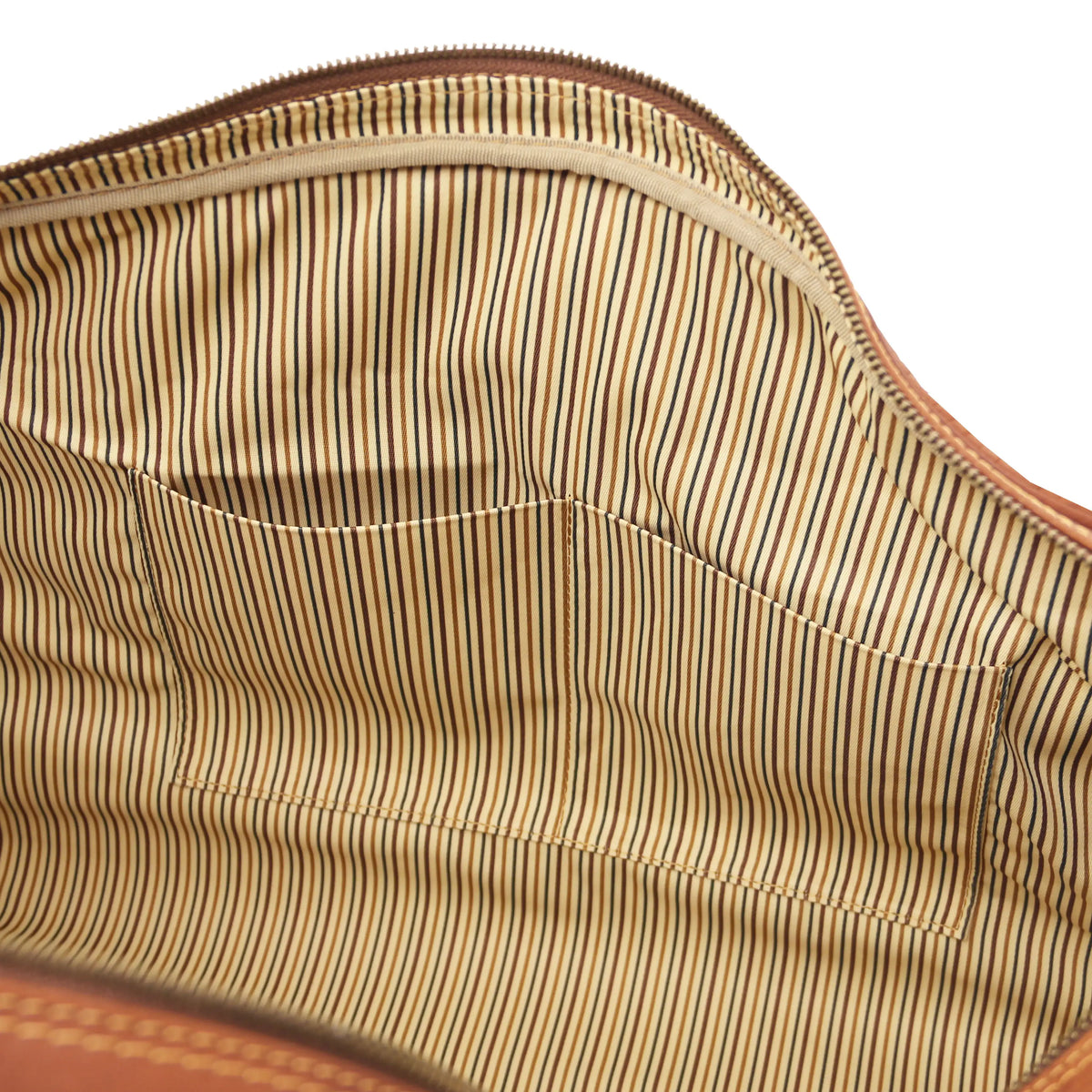Close-up of a striped fabric interior with two opened pockets