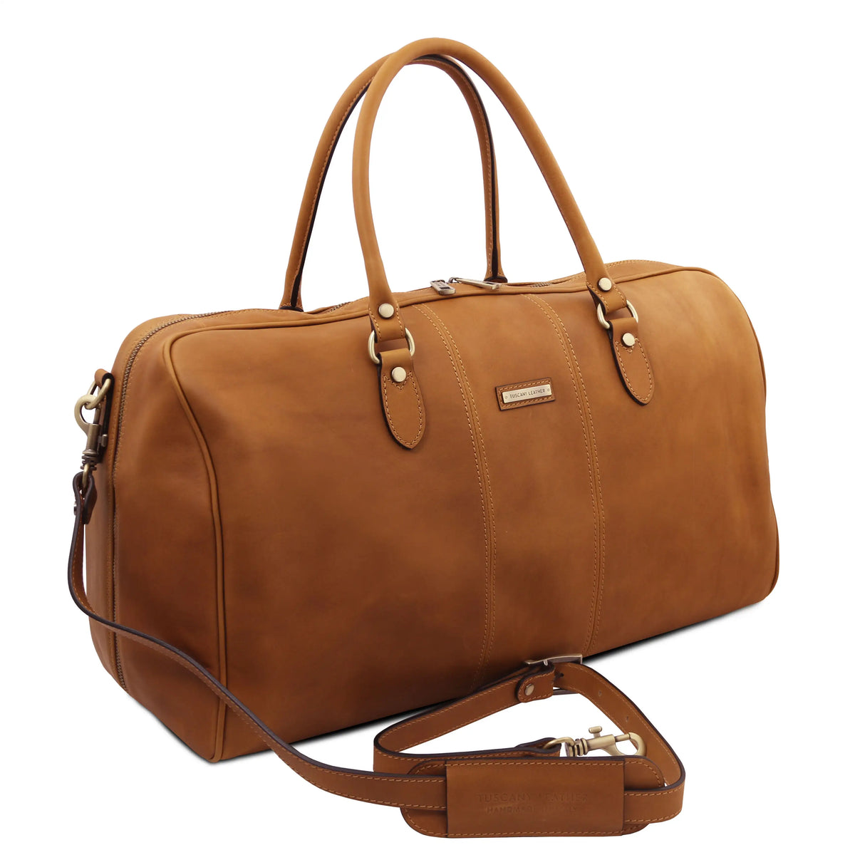 Natural leather duffel bag with detachable shoulder strap on a white background