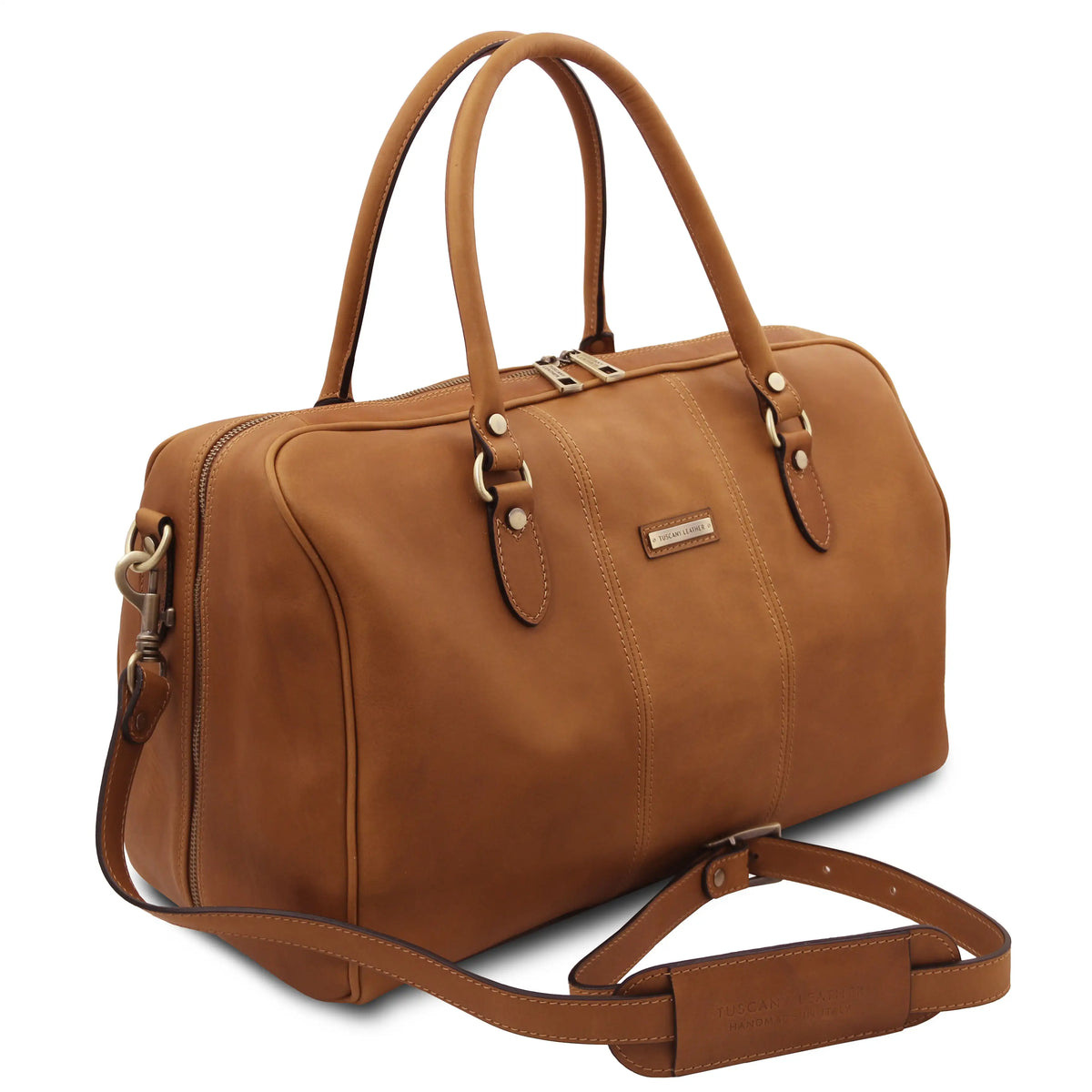 Natural leather duffel bag with a detachable strap on a white background